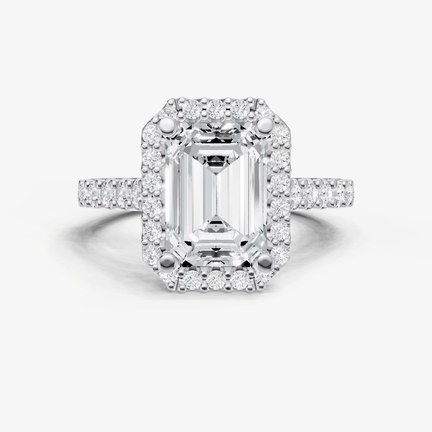Emerald Halo Solitaire Engagement Ring with Diamond Band