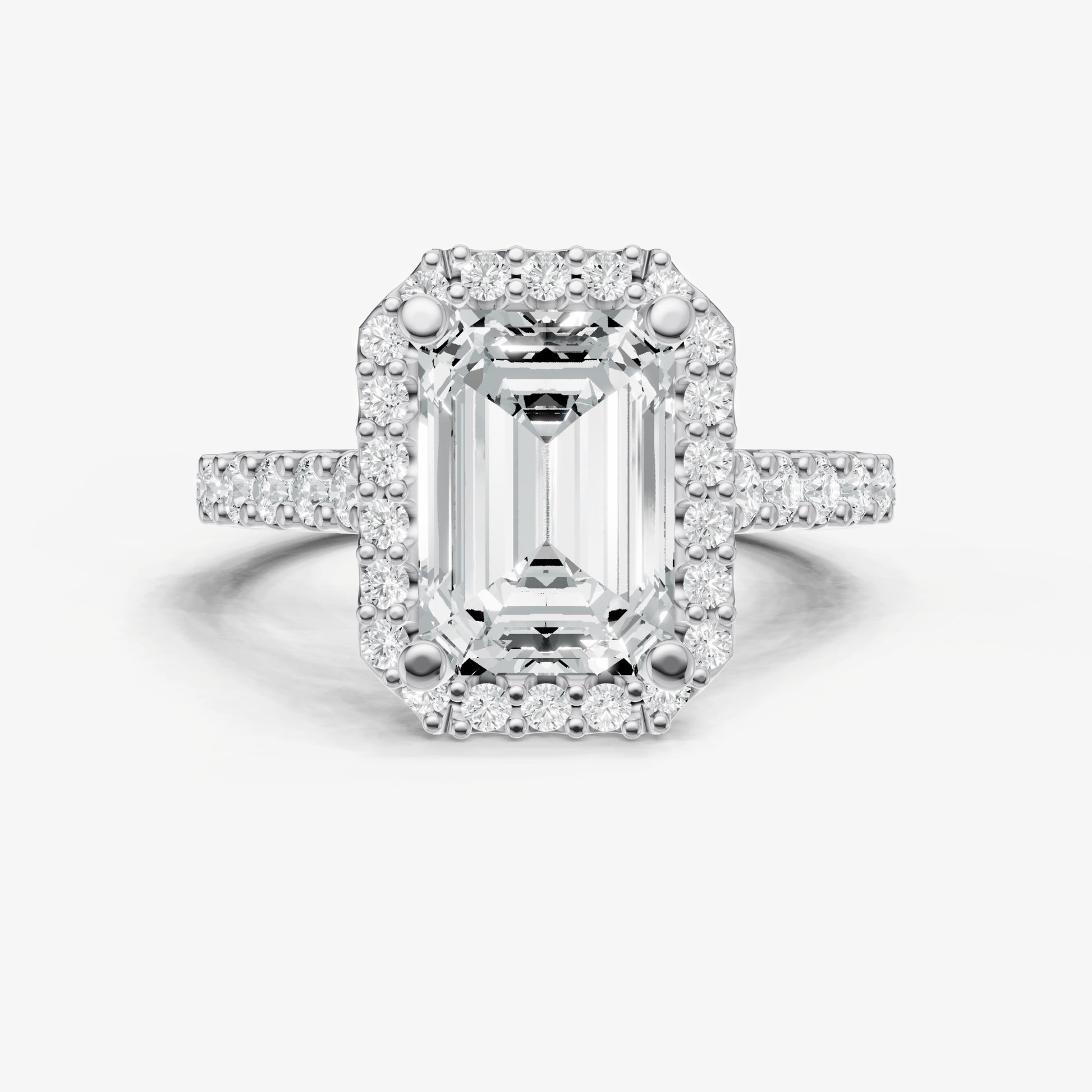Emerald Halo Solitaire Engagement Ring with Diamond Band