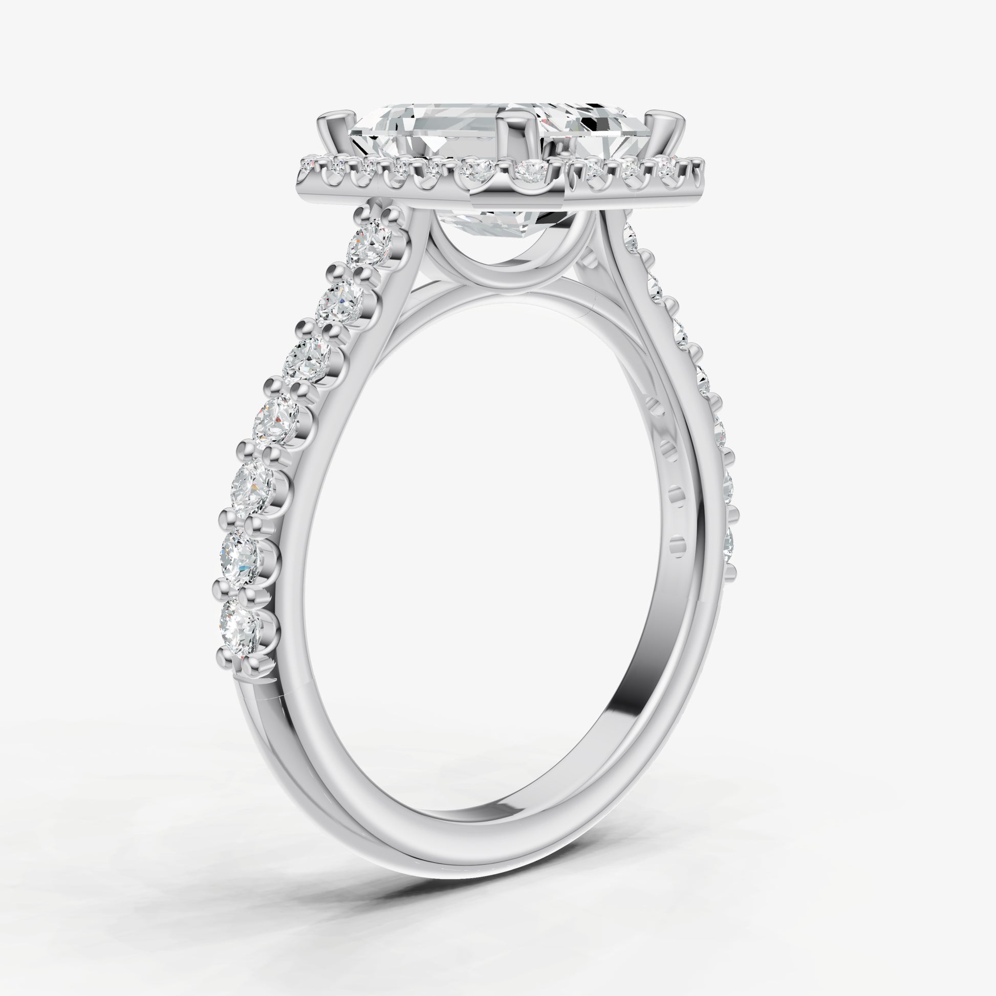 Emerald Halo Solitaire Engagement Ring with Diamond Band