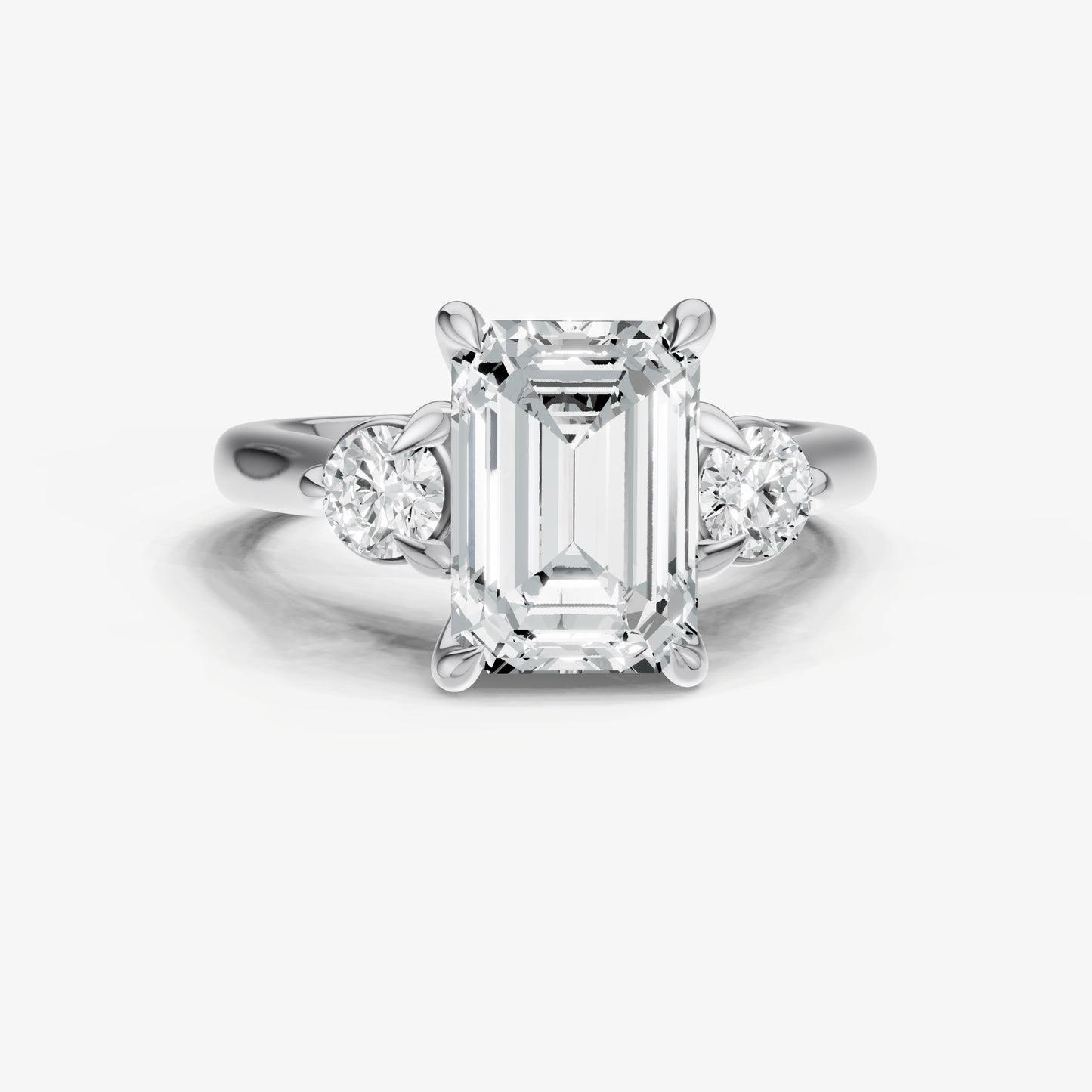 Emerald Engagement Ring with Round Side Diamonds