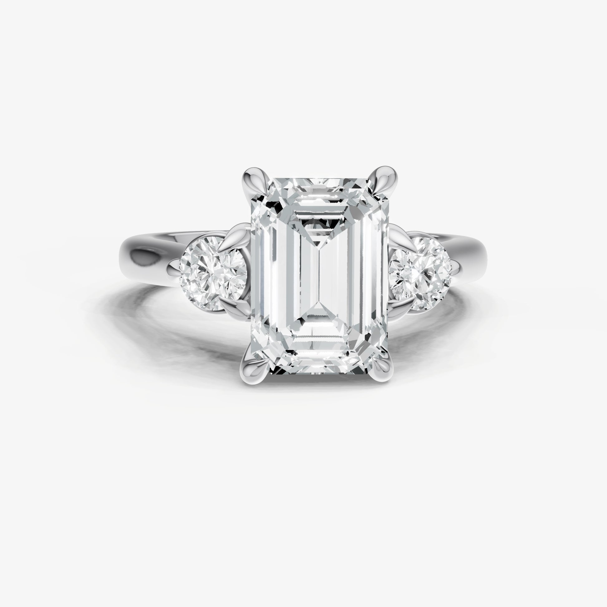 Emerald Engagement Ring with Round Side Diamonds