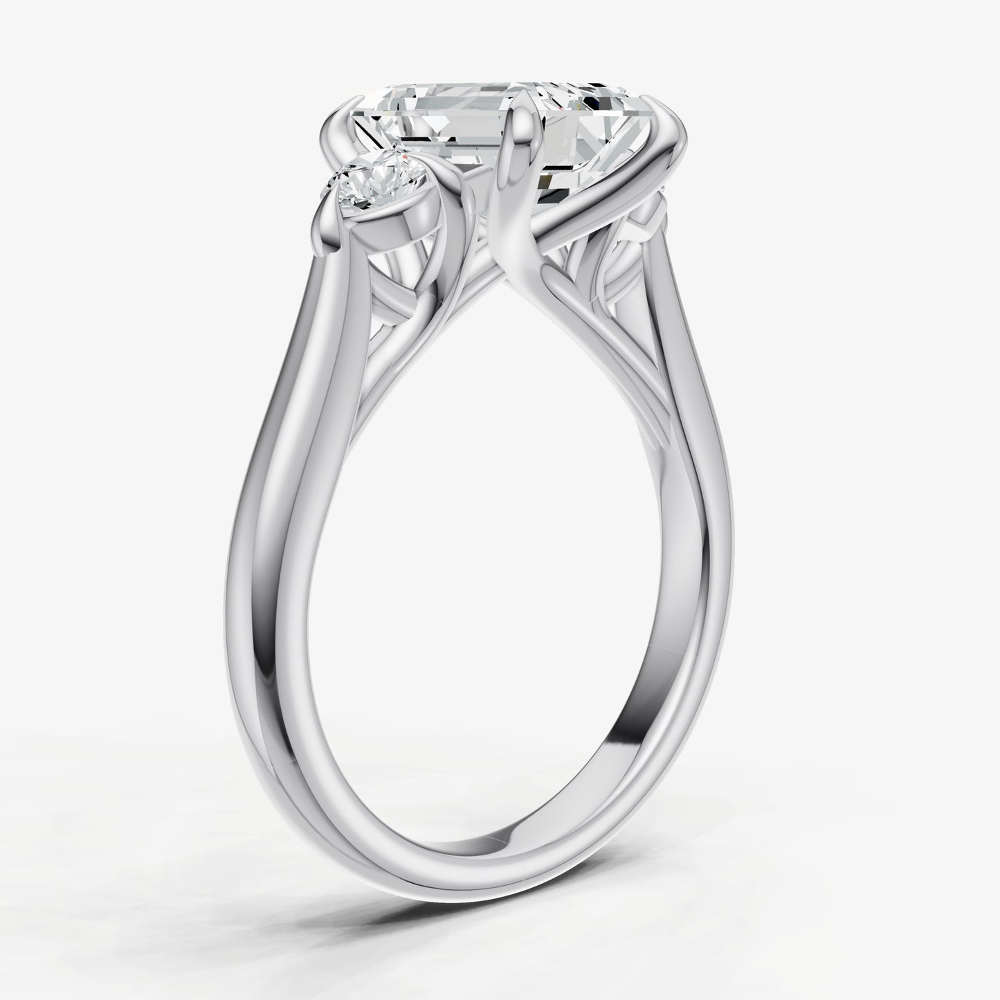 Emerald Engagement Ring with Round Side Diamonds