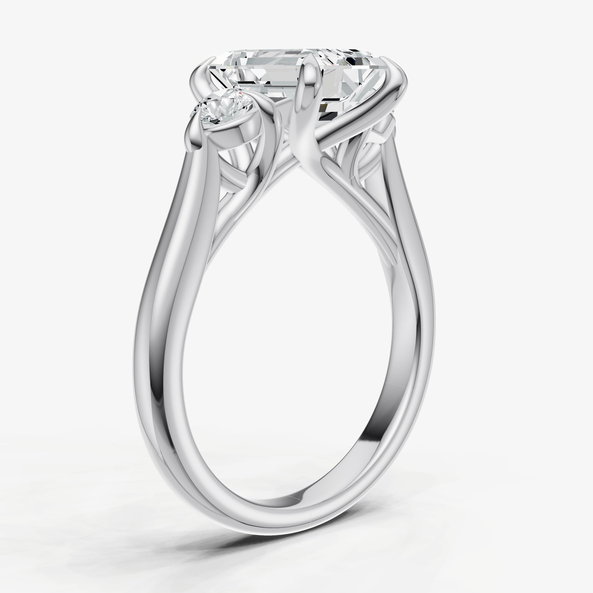 Emerald Engagement Ring with Round Side Diamonds
