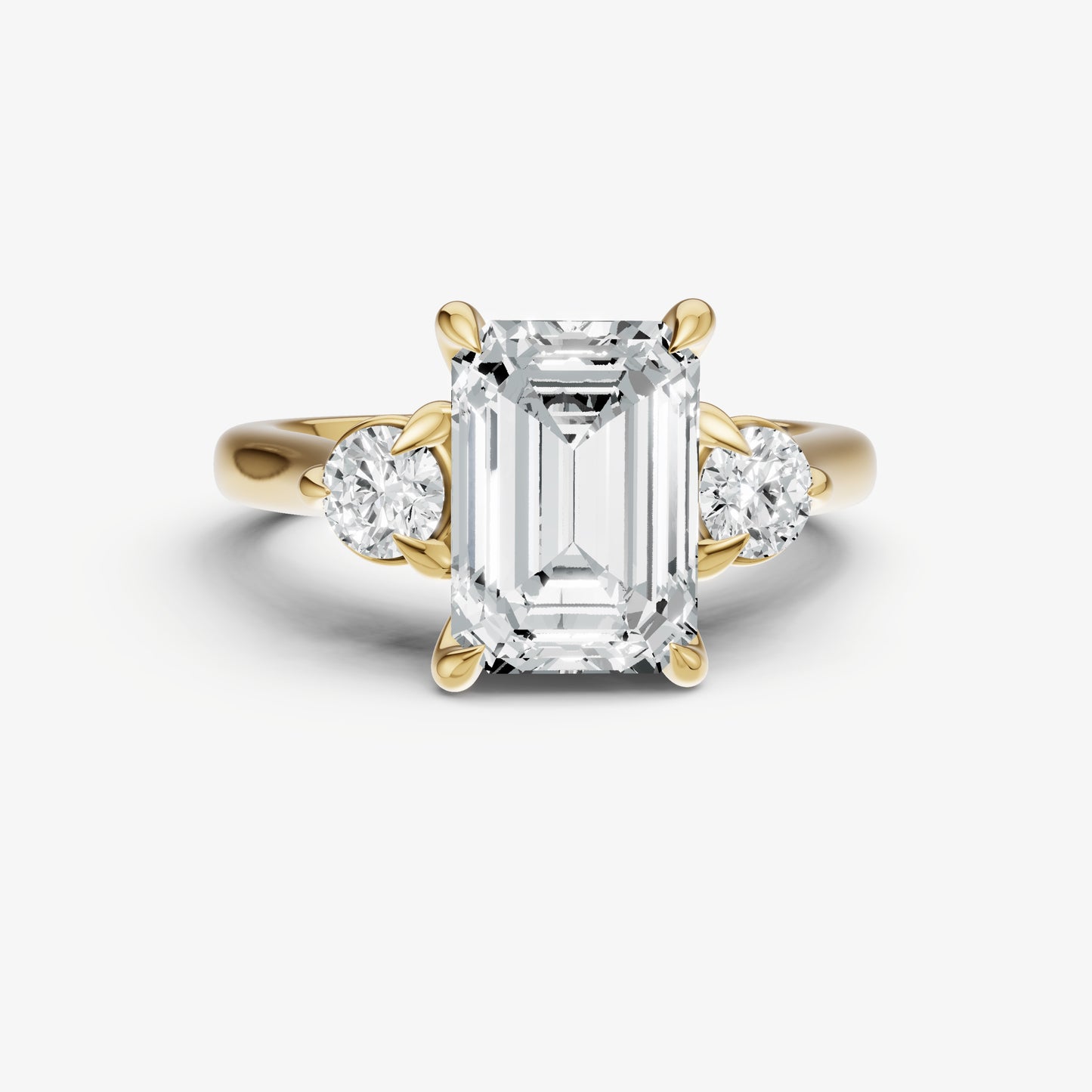 Emerald Engagement Ring with Round Side Diamonds