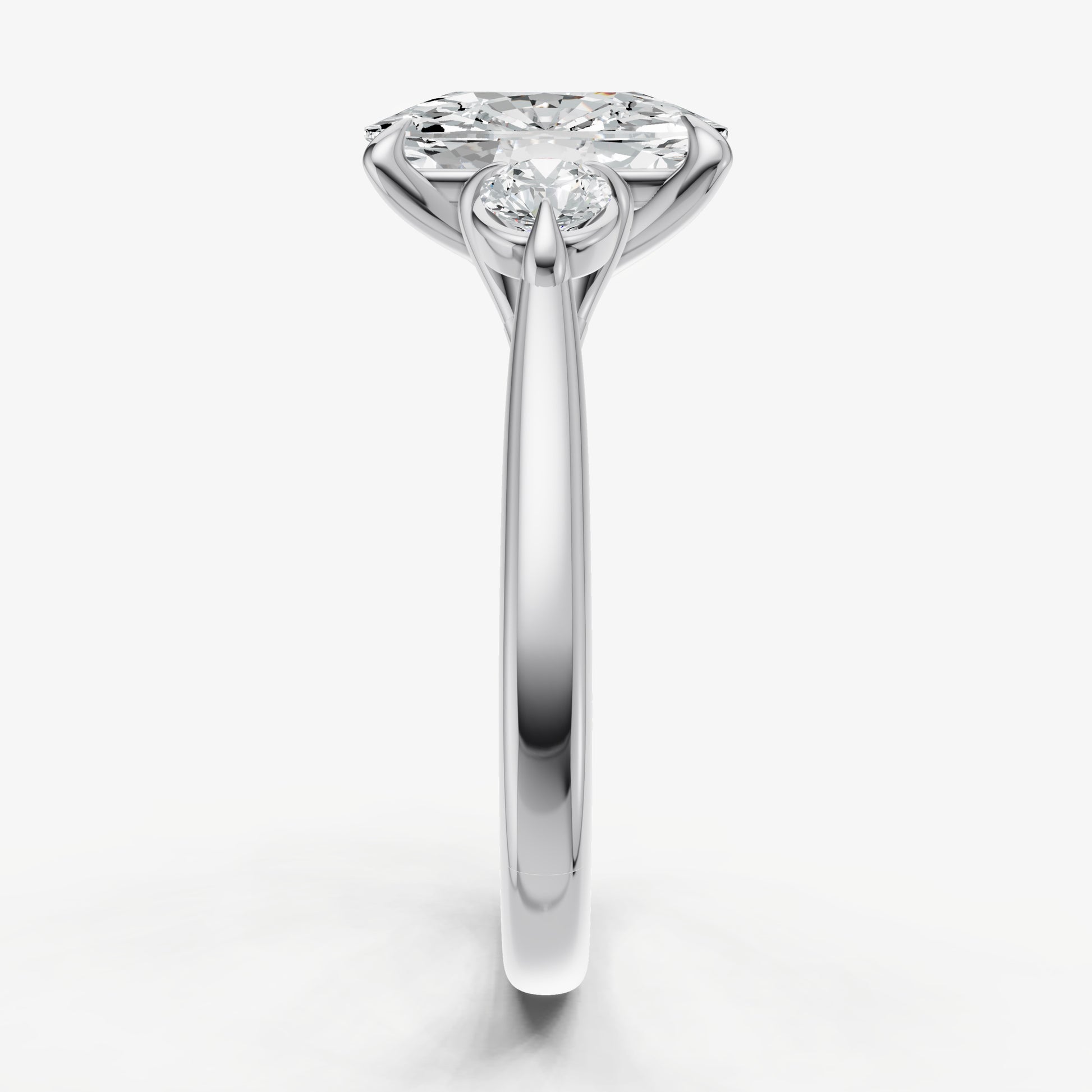 Elongated Cushion Engagement Ring with Round Side Diamonds
