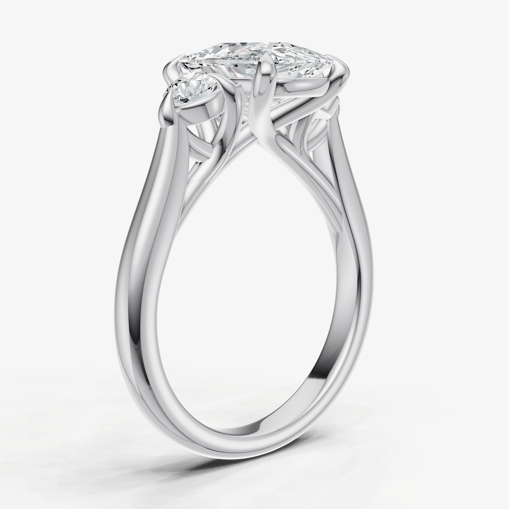 Elongated Cushion Engagement Ring with Round Side Diamonds