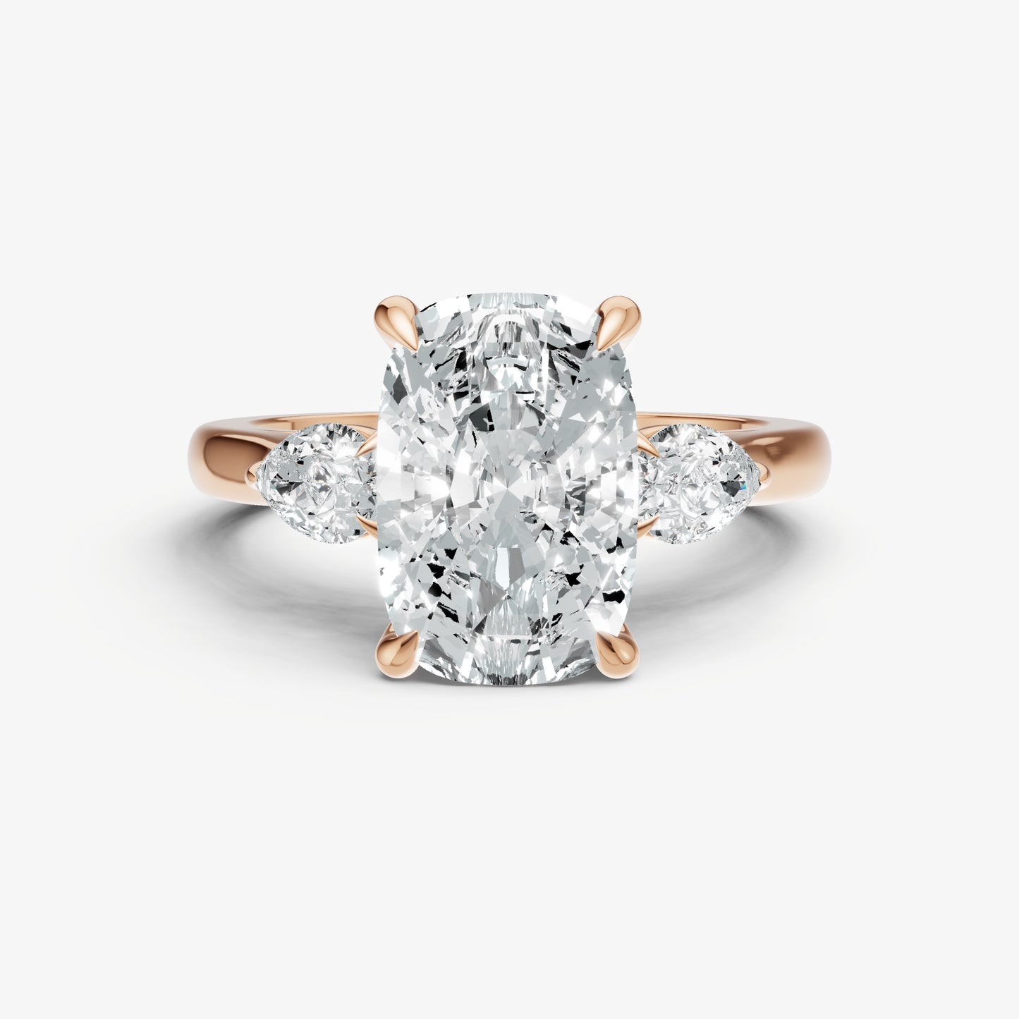 Elongated Cushion Engagement Ring with Pear Side Diamonds