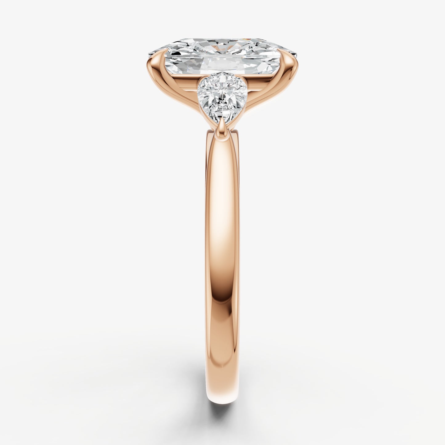 Elongated Cushion Engagement Ring with Pear Side Diamonds