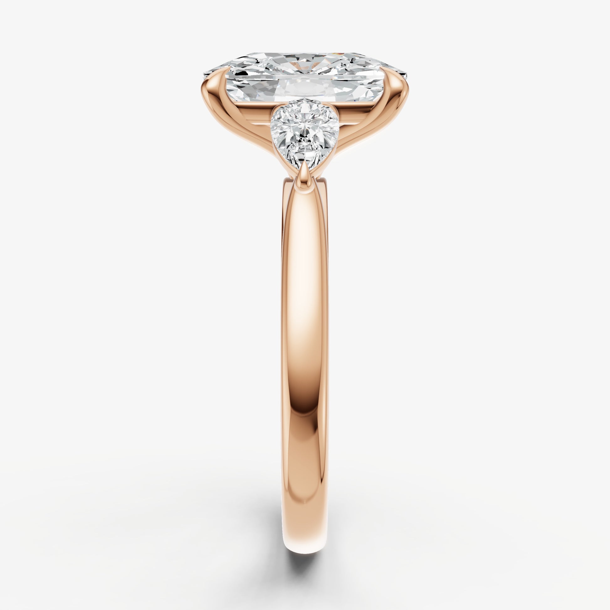 Elongated Cushion Engagement Ring with Pear Side Diamonds