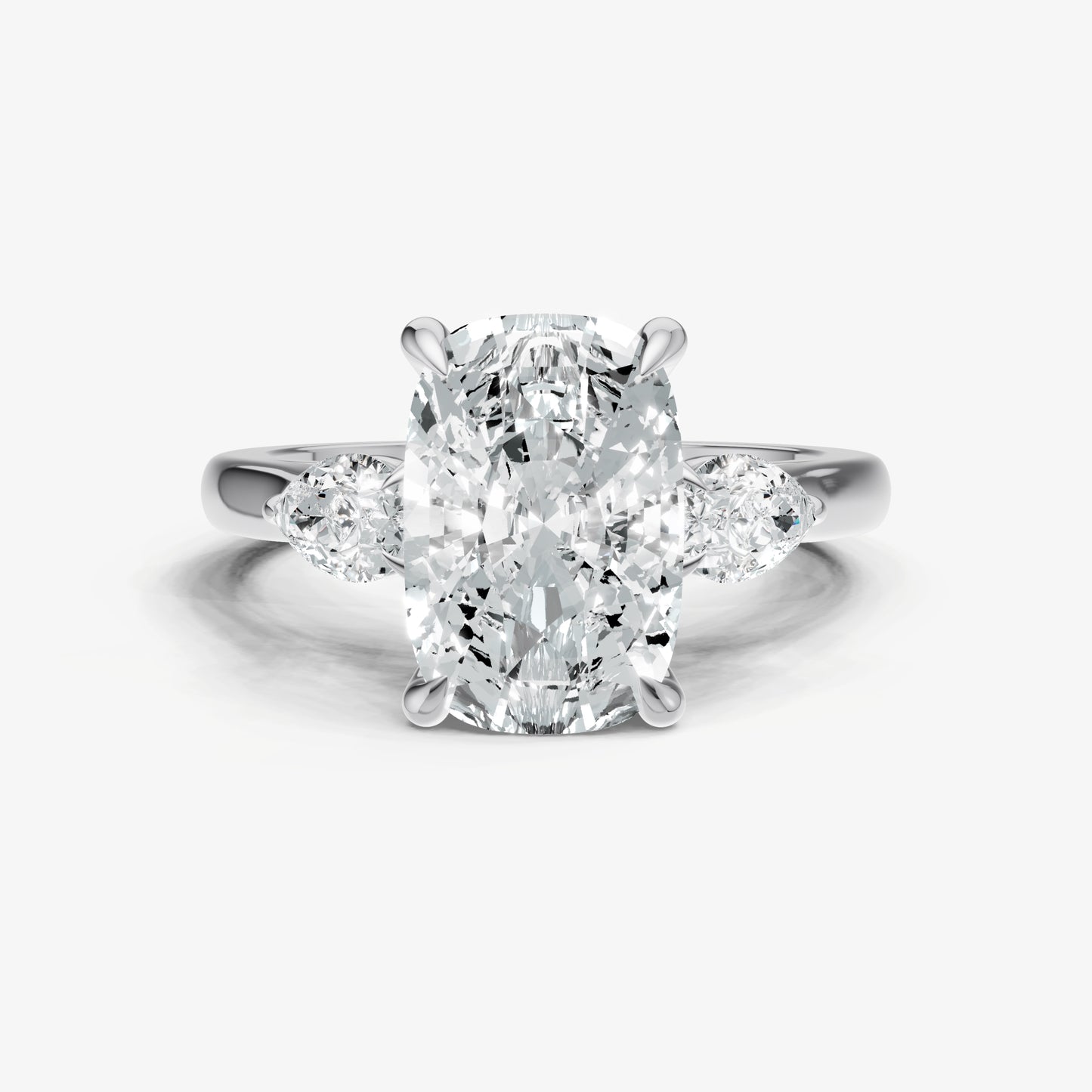 Elongated Cushion Engagement Ring with Pear Side Diamonds