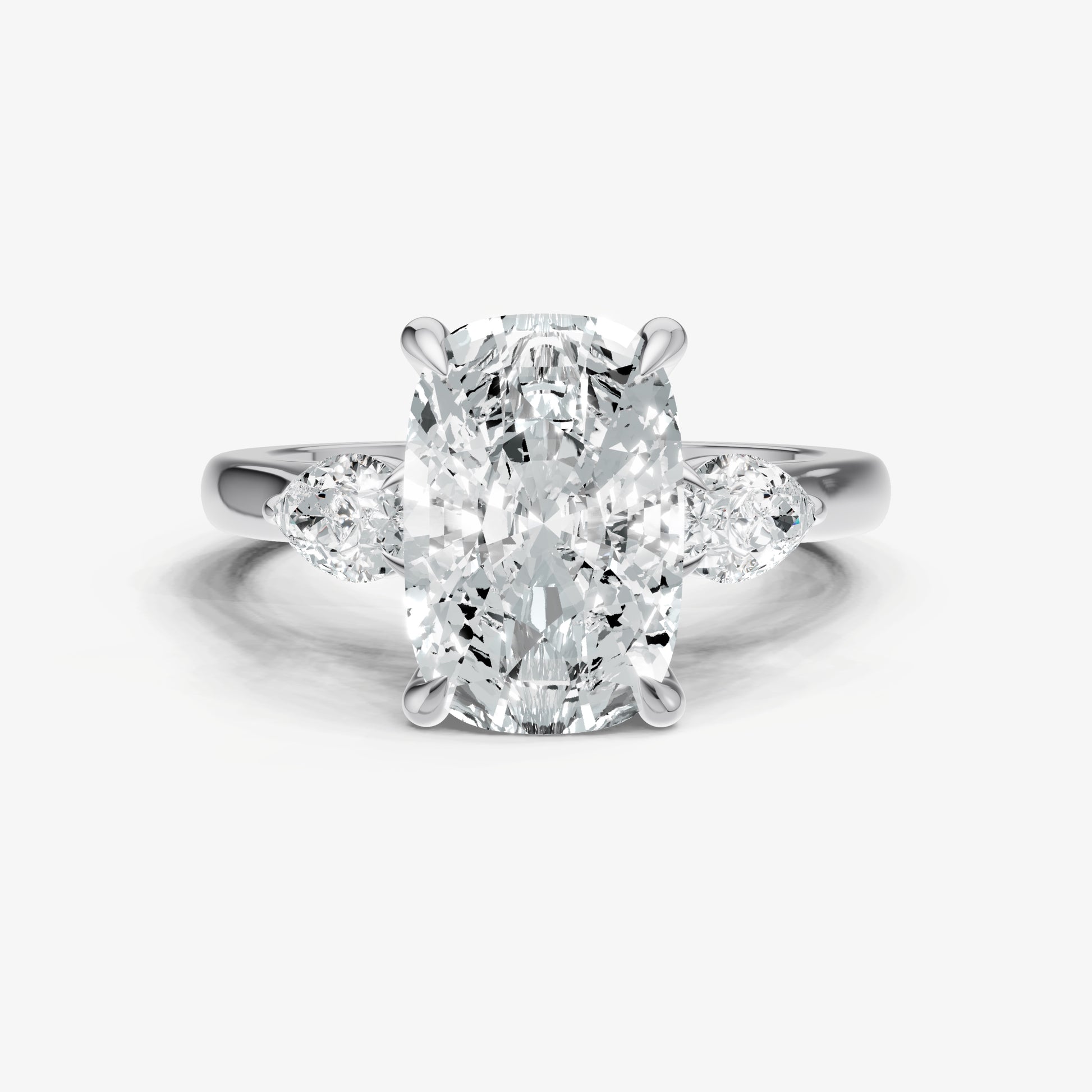 Elongated Cushion Engagement Ring with Pear Side Diamonds