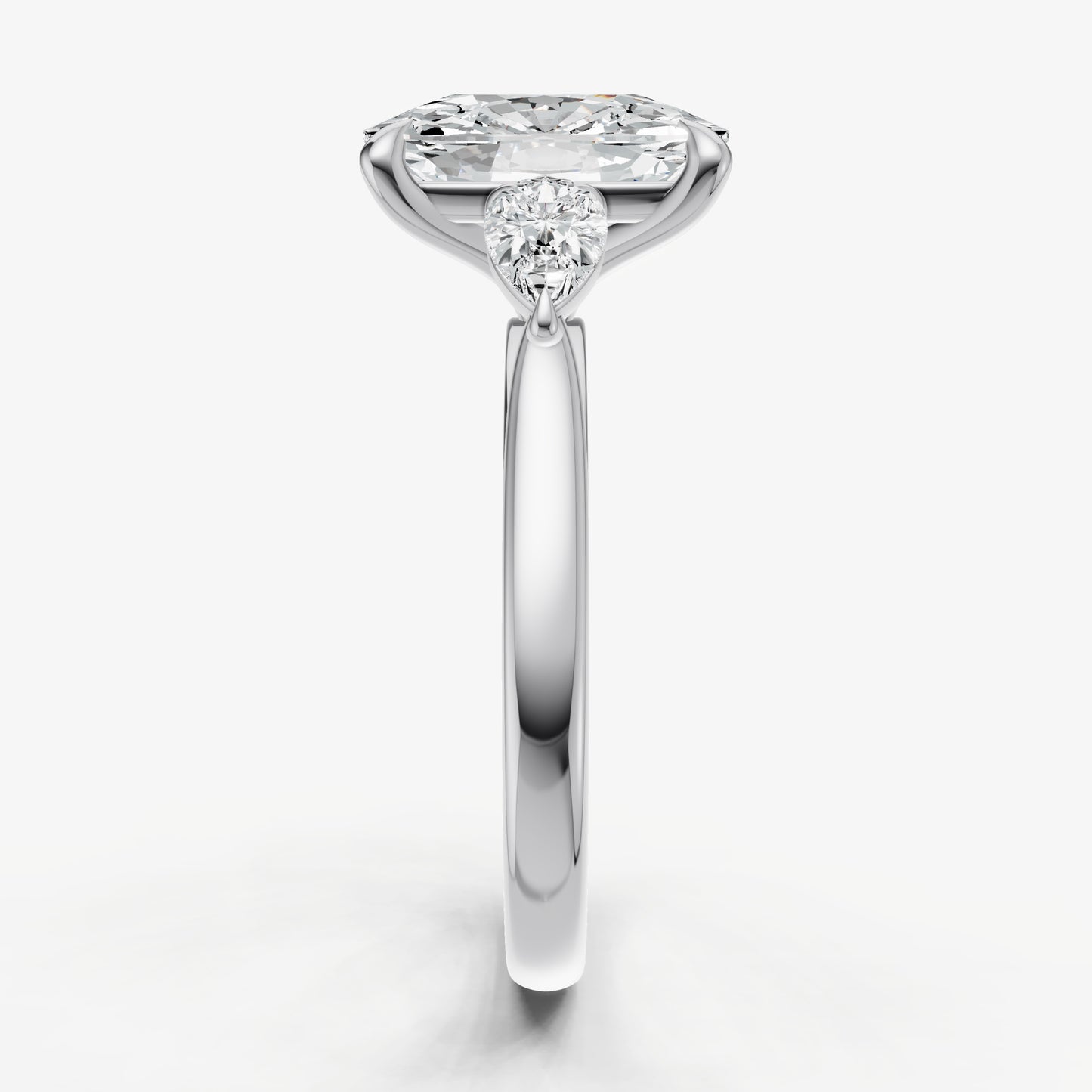 Elongated Cushion Engagement Ring with Pear Side Diamonds