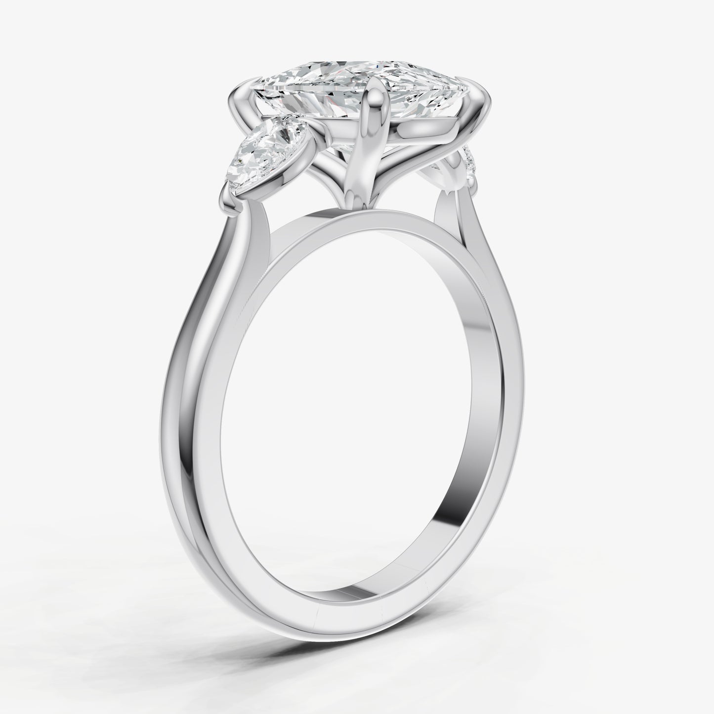 Elongated Cushion Engagement Ring with Pear Side Diamonds