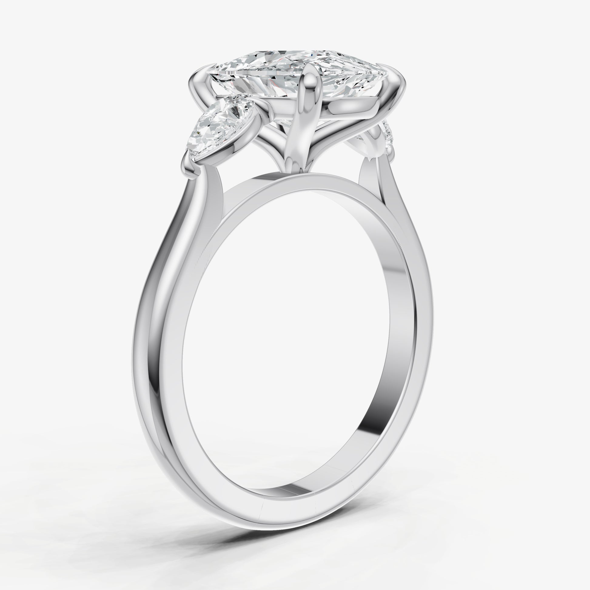 Elongated Cushion Engagement Ring with Pear Side Diamonds