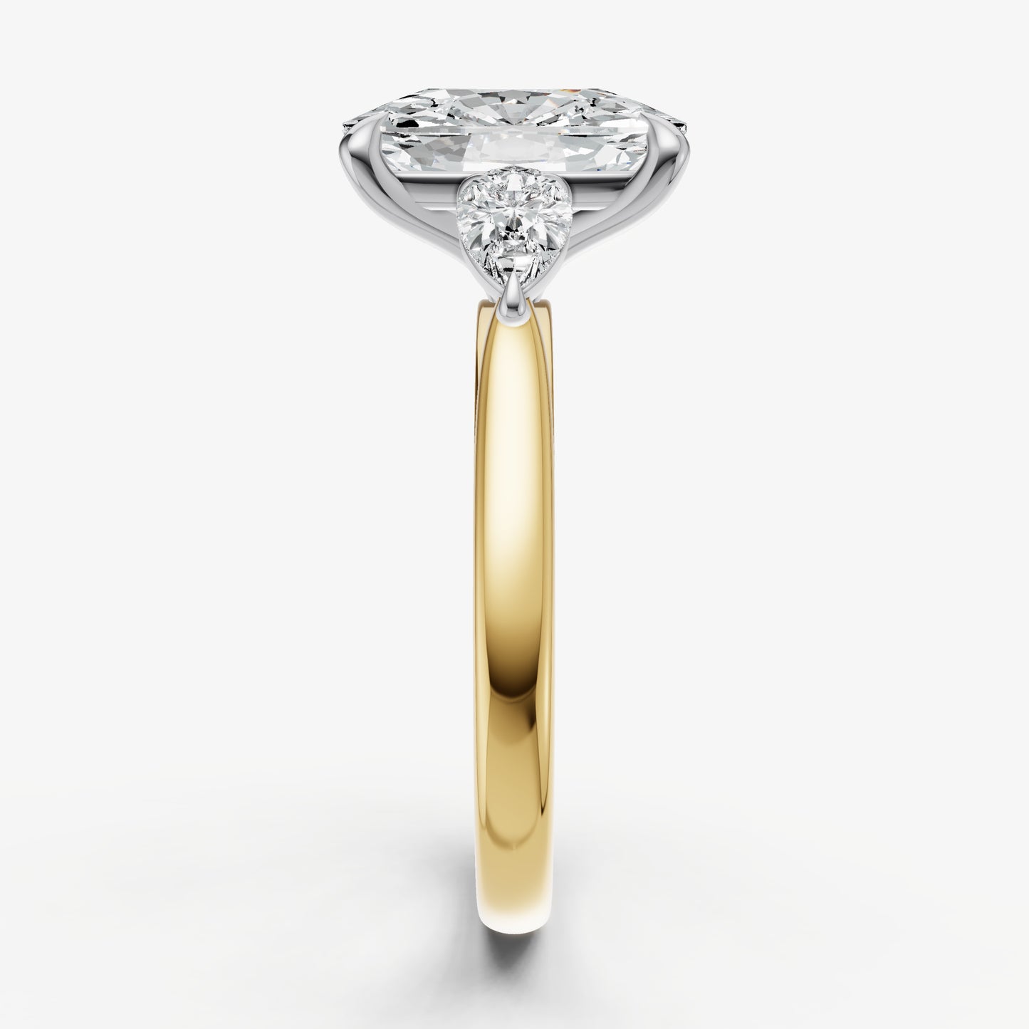 Elongated Cushion Engagement Ring with Pear Side Diamonds