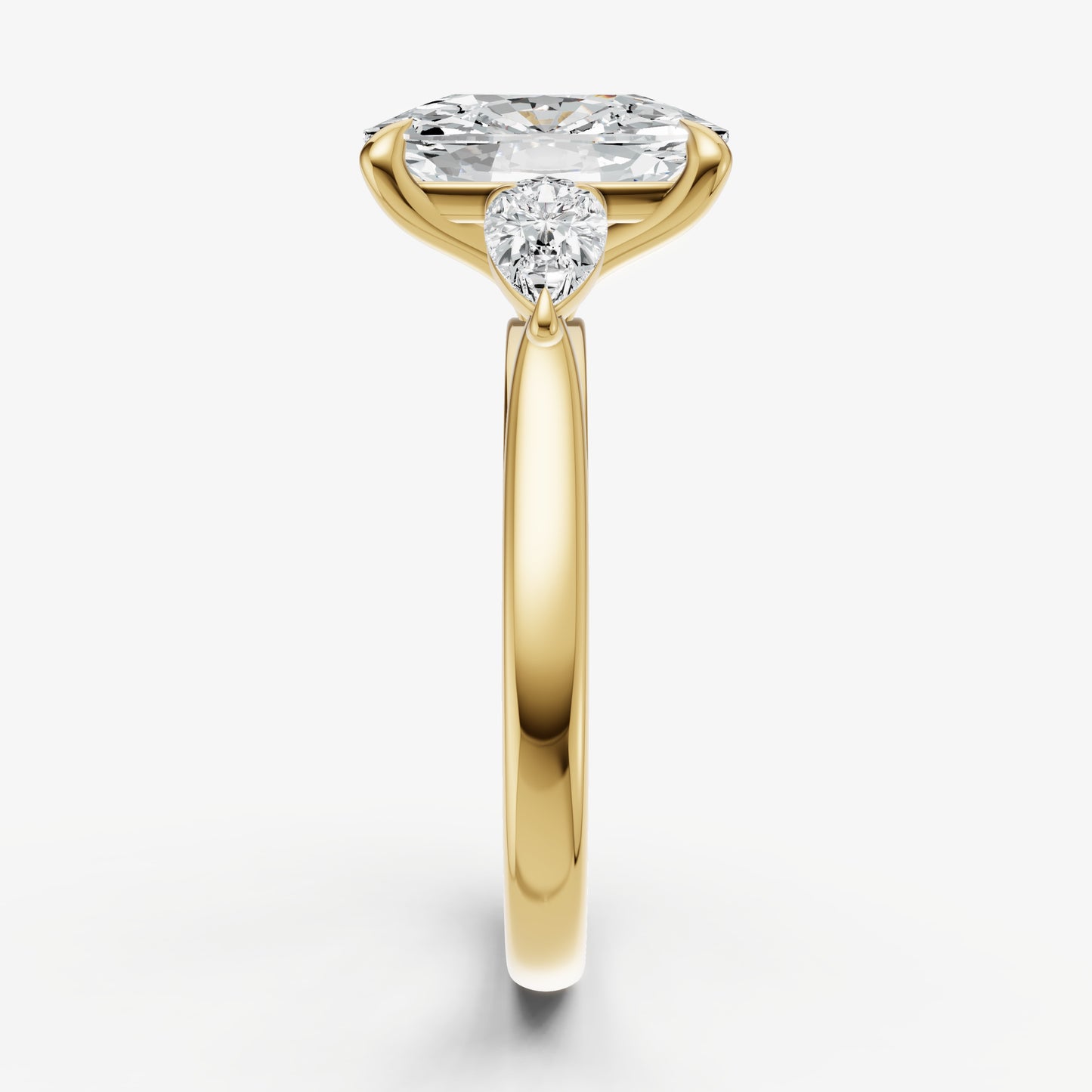 Elongated Cushion Engagement Ring with Pear Side Diamonds