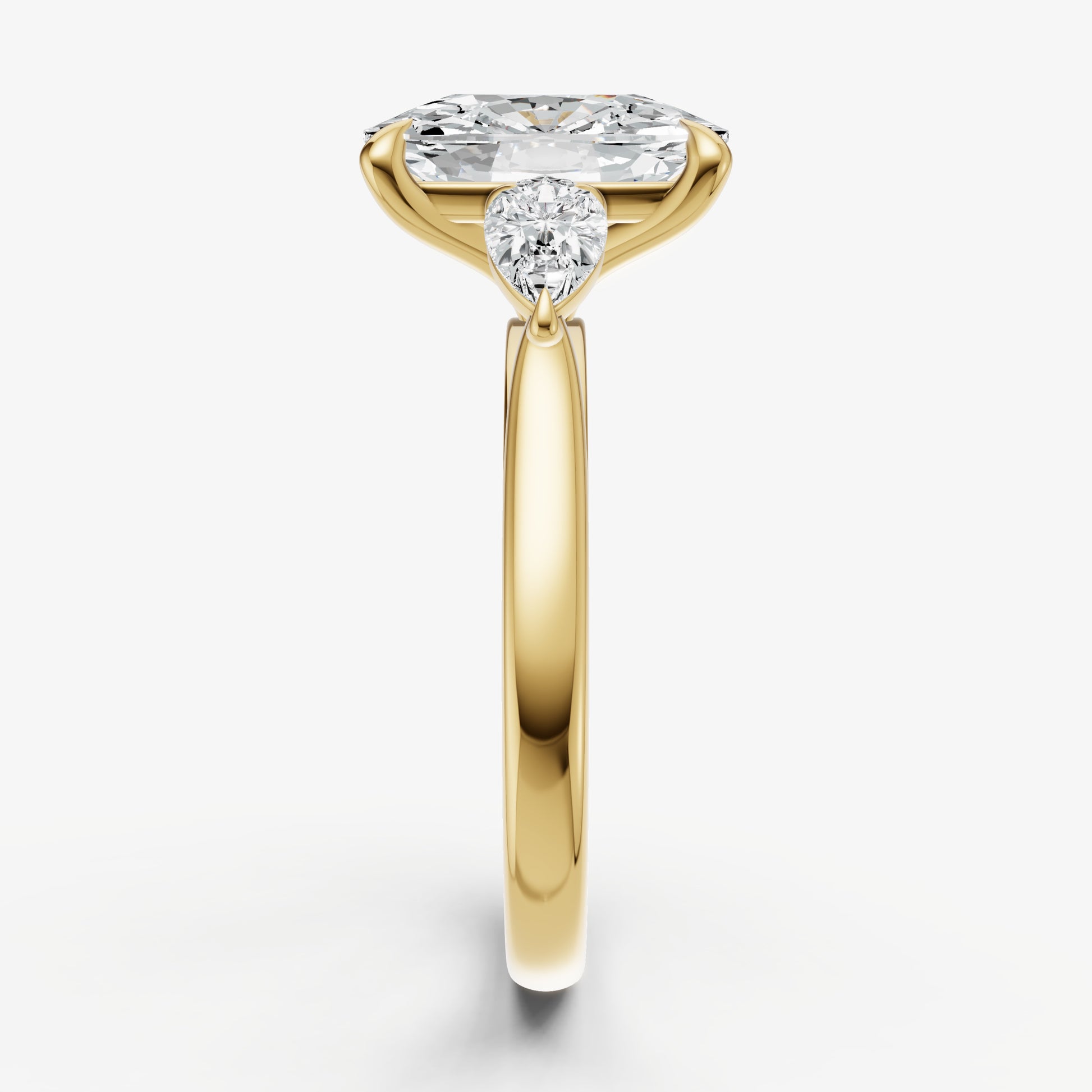 Elongated Cushion Engagement Ring with Pear Side Diamonds