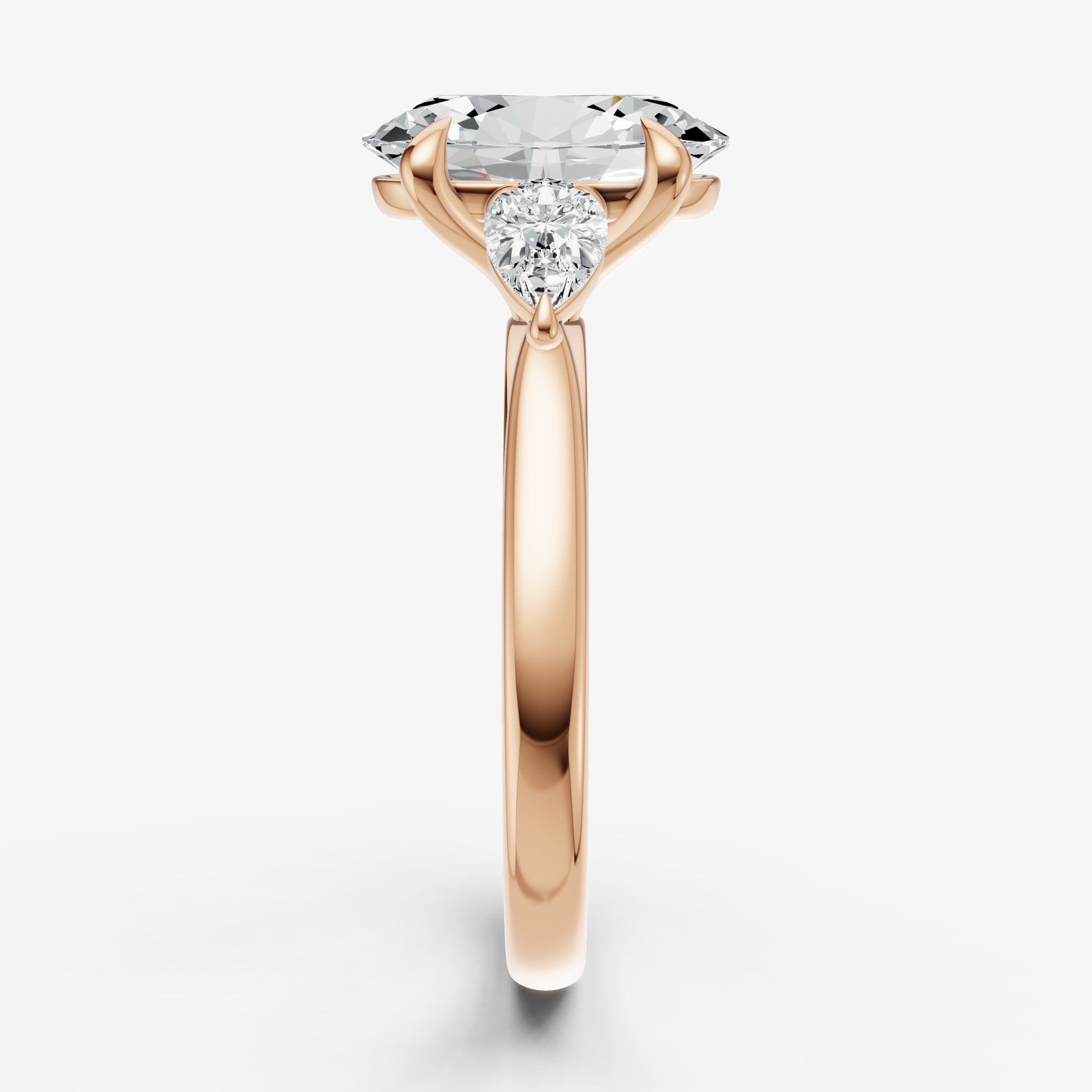 Oval Engagement Ring with Pear Side Diamonds