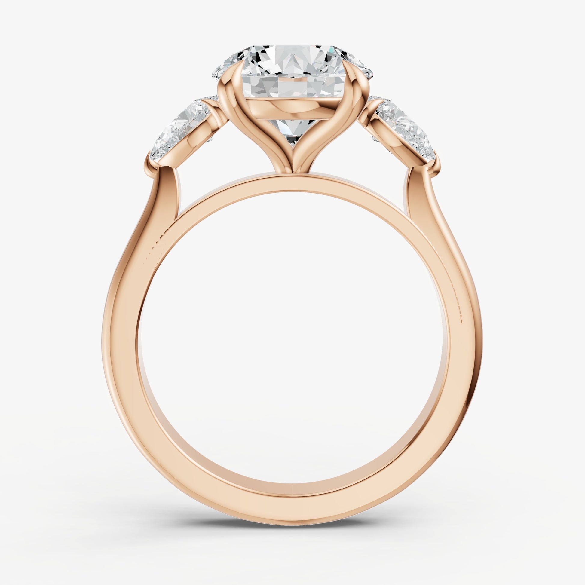 Round Engagement Ring with Pear Side Diamonds