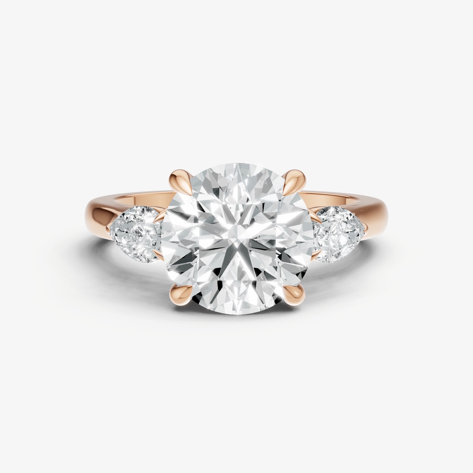 Round Engagement Ring with Pear Side Diamonds