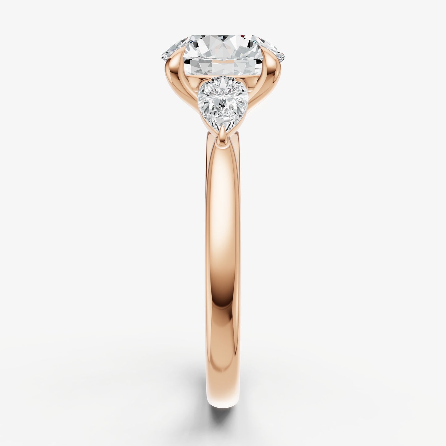 Round Engagement Ring with Pear Side Diamonds