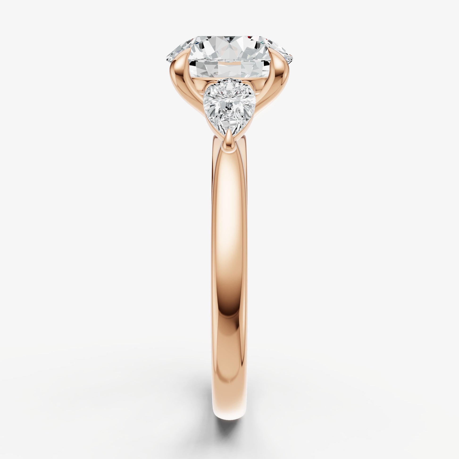 Round Engagement Ring with Pear Side Diamonds