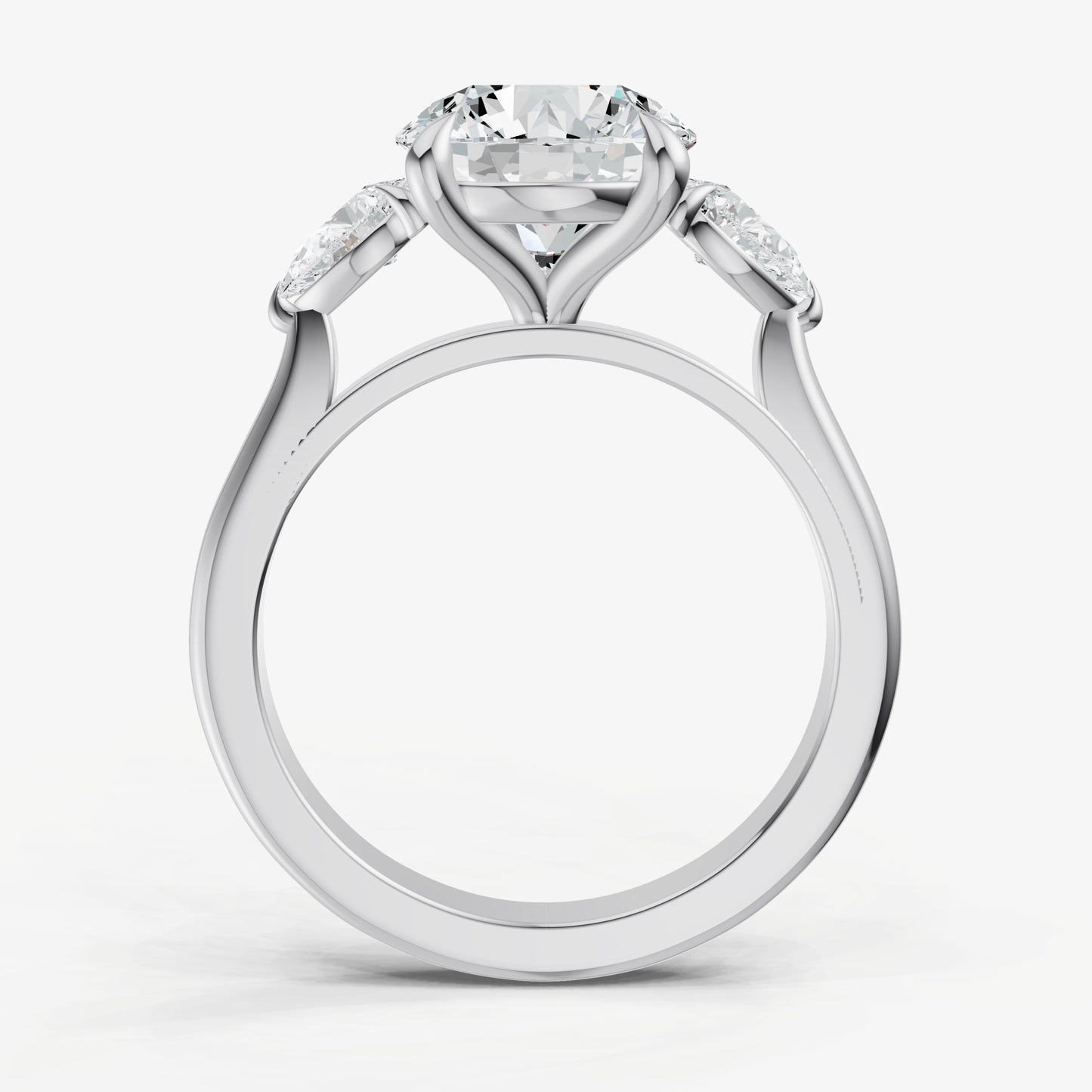 Round Engagement Ring with Pear Side Diamonds