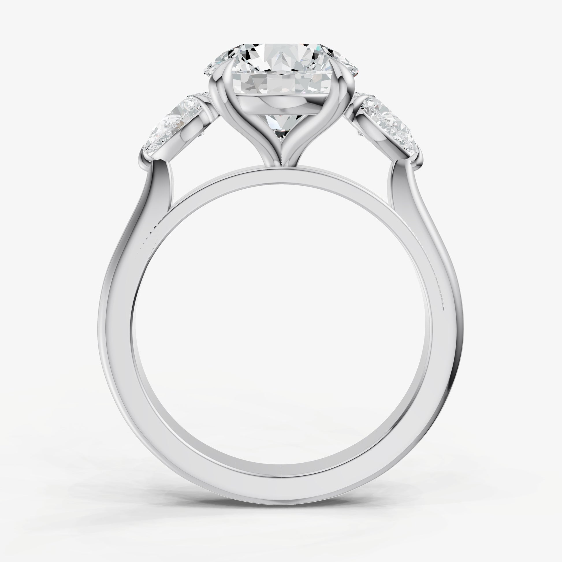 Round Engagement Ring with Pear Side Diamonds