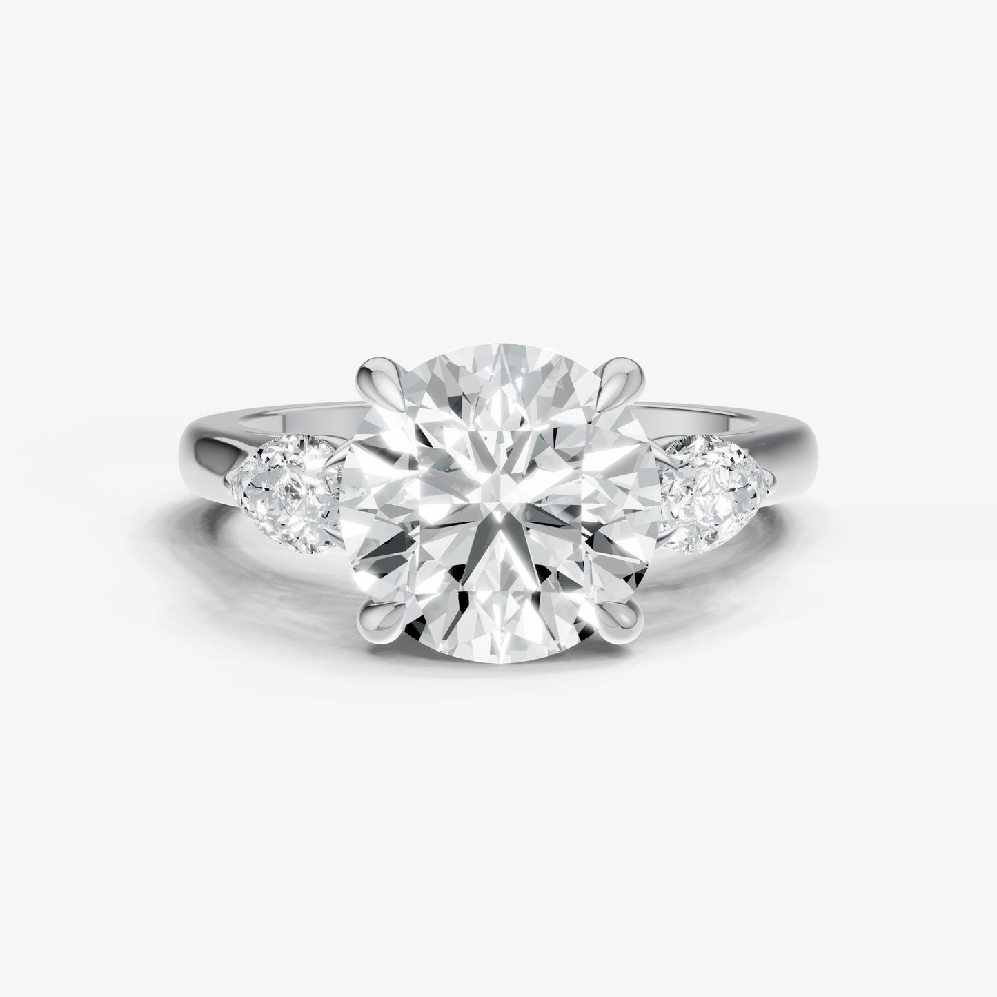 Round Engagement Ring with Pear Side Diamonds