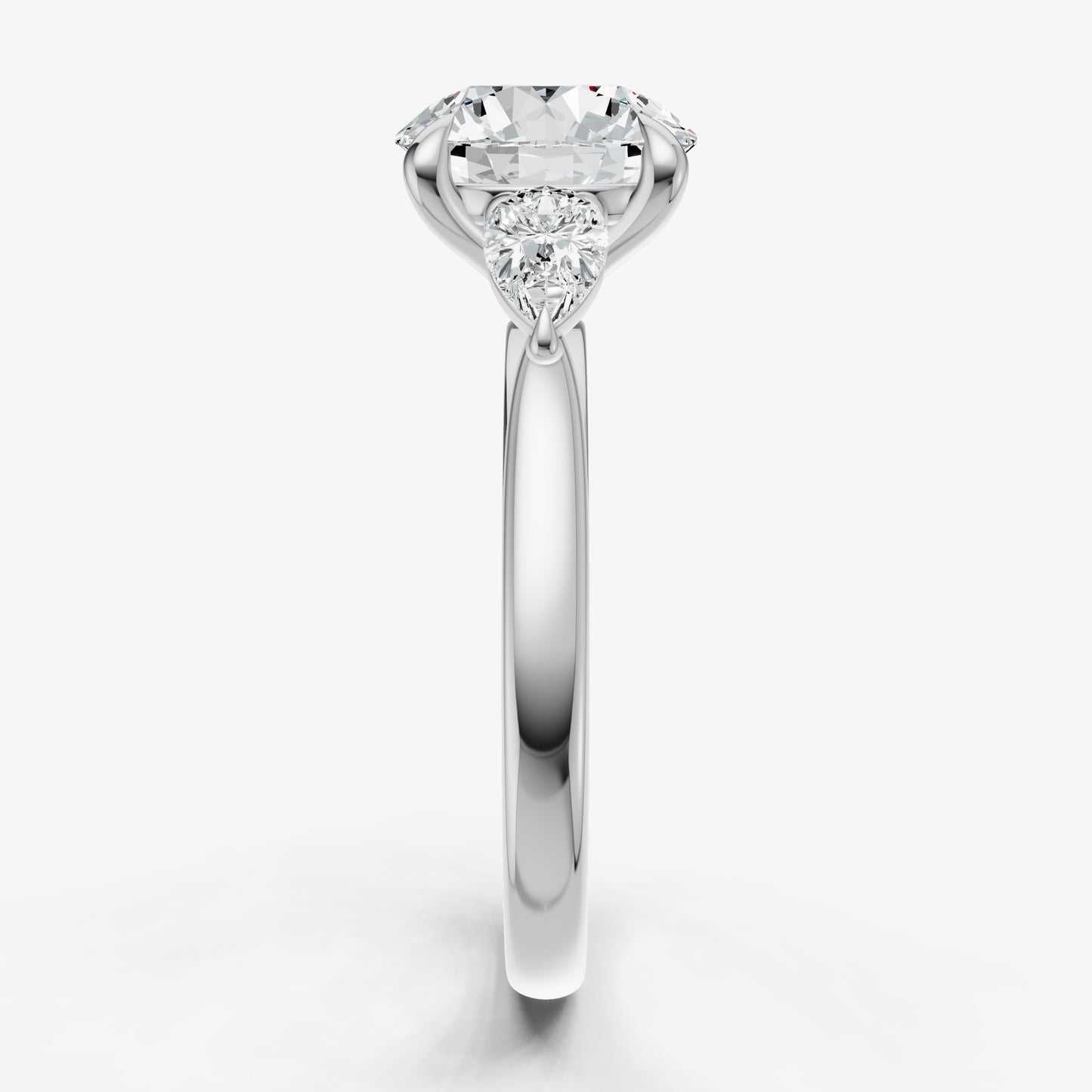 Round Engagement Ring with Pear Side Diamonds