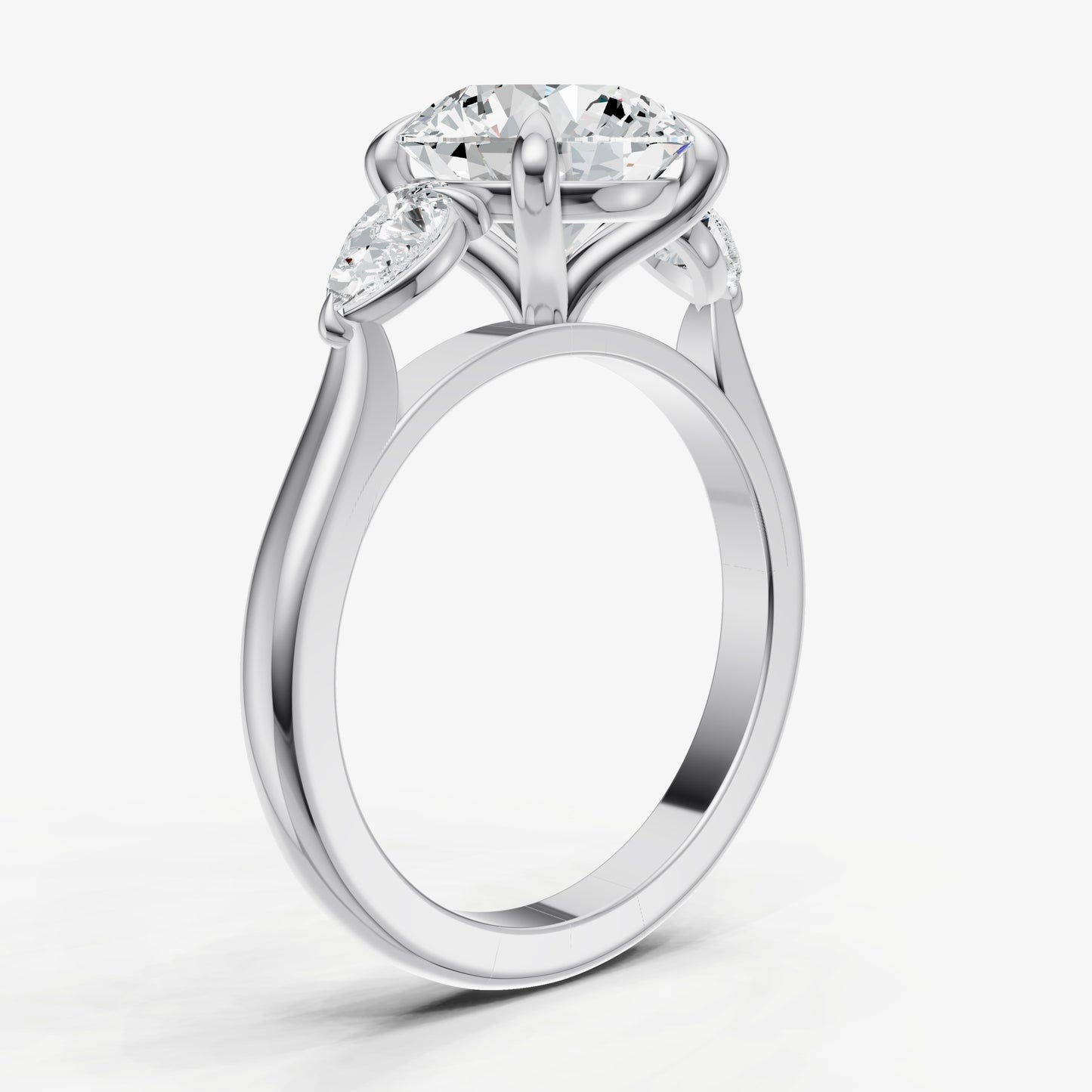 Round Engagement Ring with Pear Side Diamonds