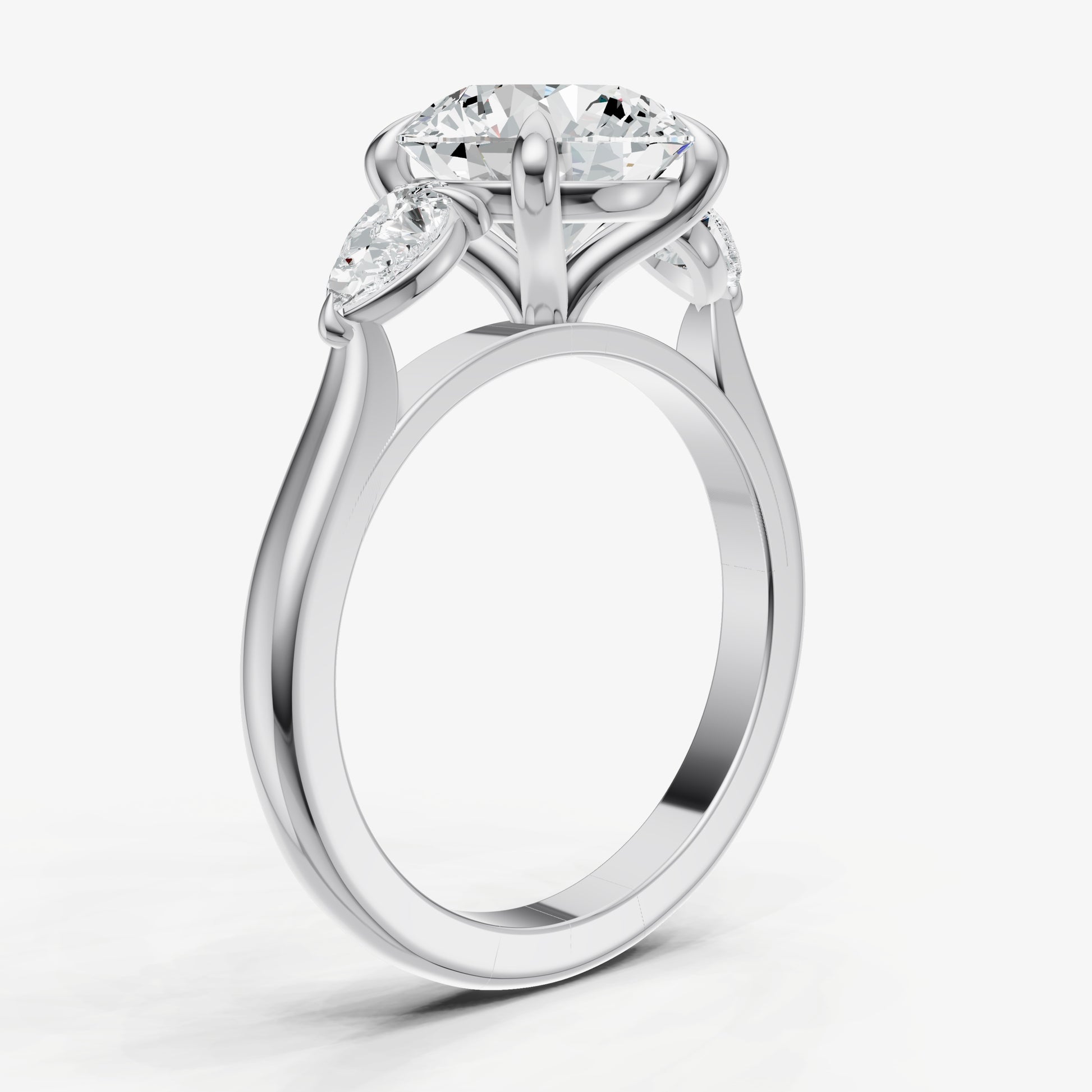 Round Engagement Ring with Pear Side Diamonds
