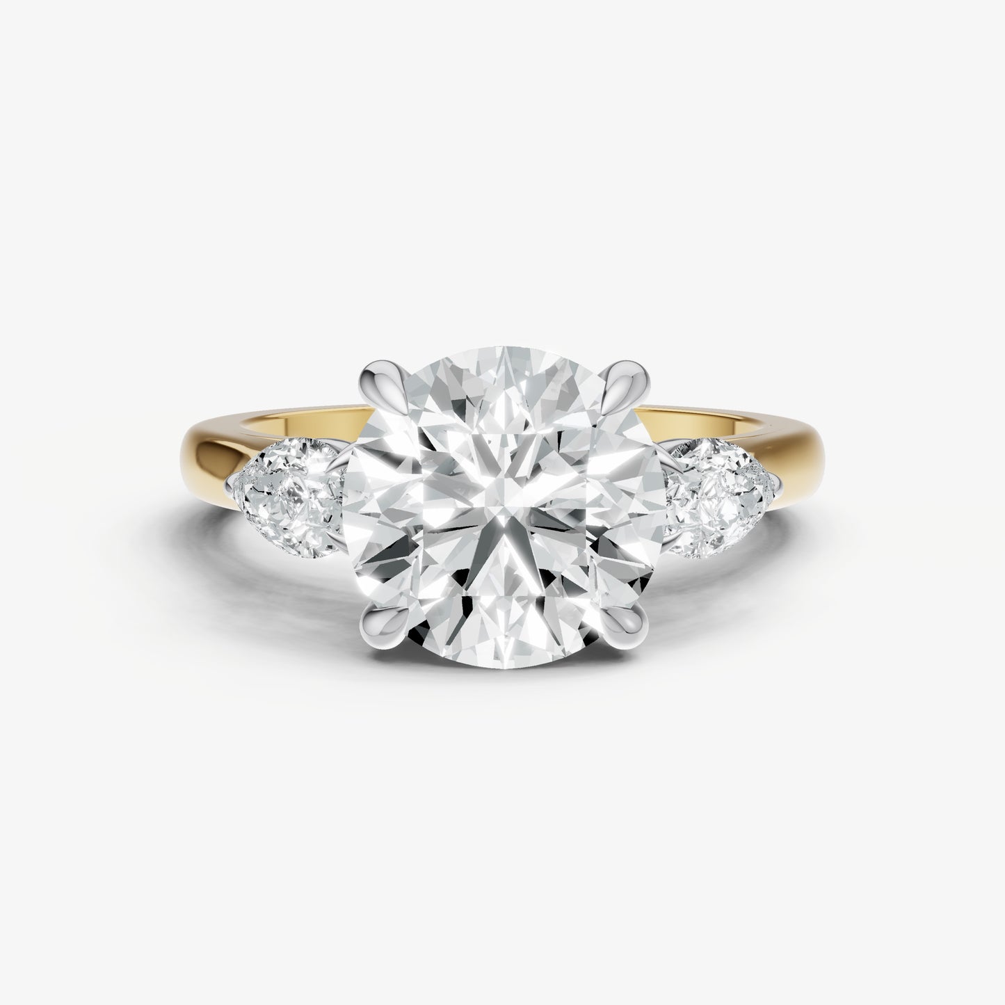 Round Engagement Ring with Pear Side Diamonds