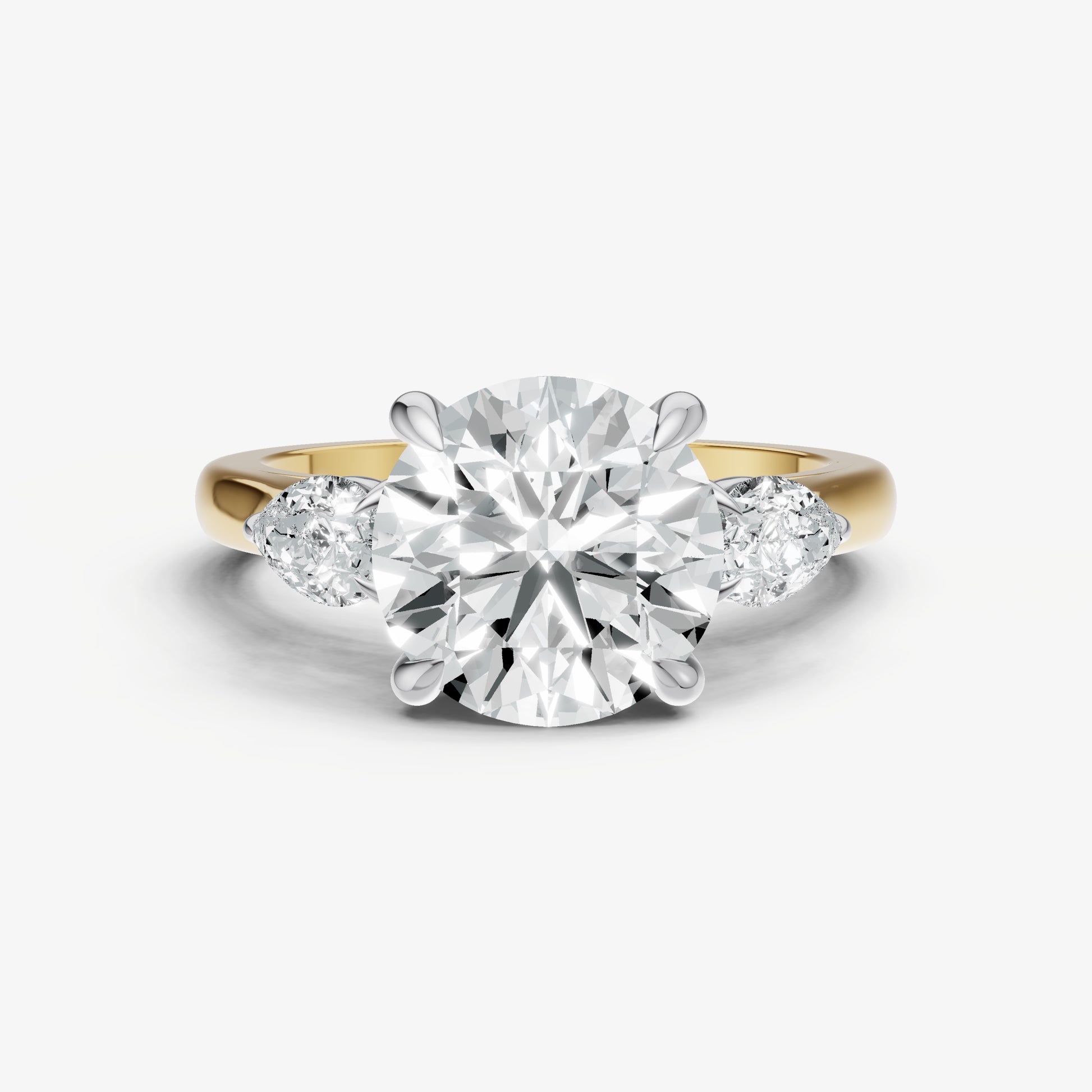 Round Engagement Ring with Pear Side Diamonds