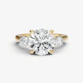 Round Engagement Ring with Pear Side Diamonds