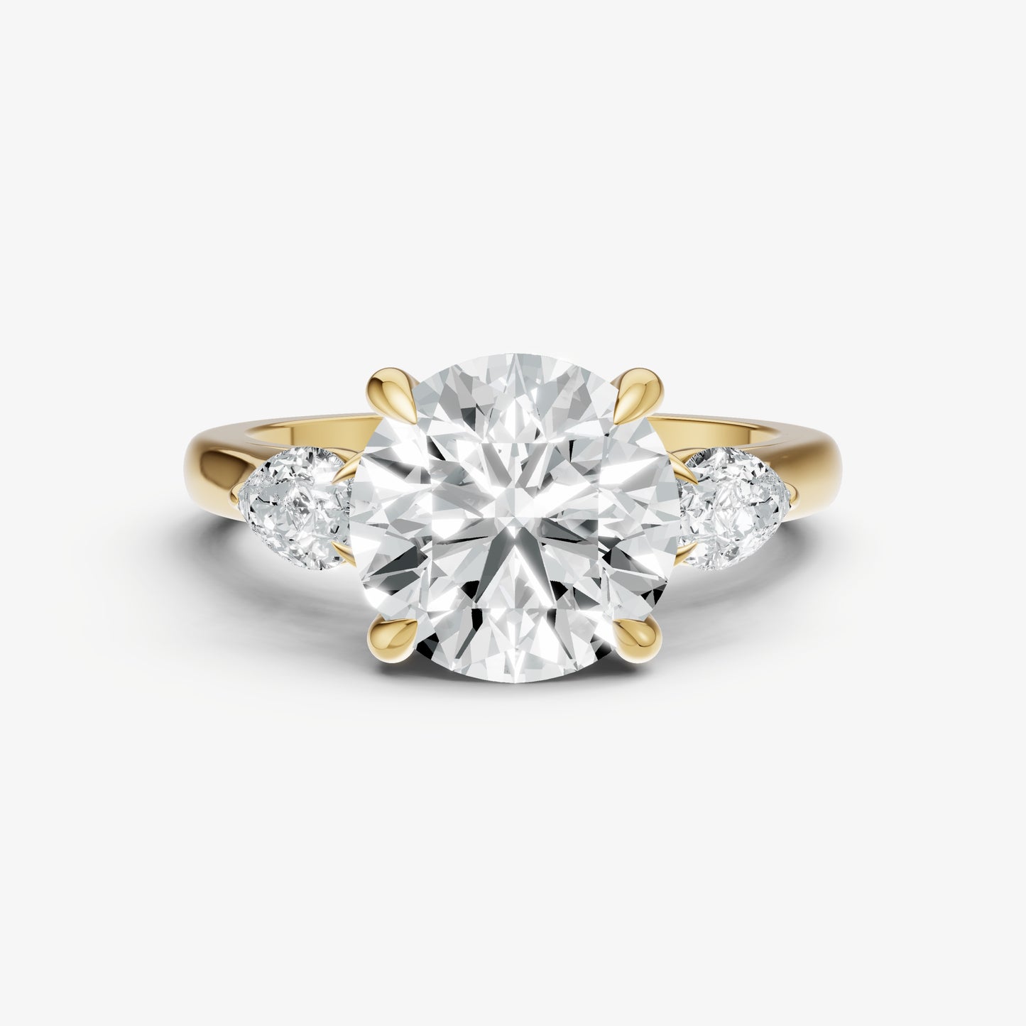 Round Engagement Ring with Pear Side Diamonds