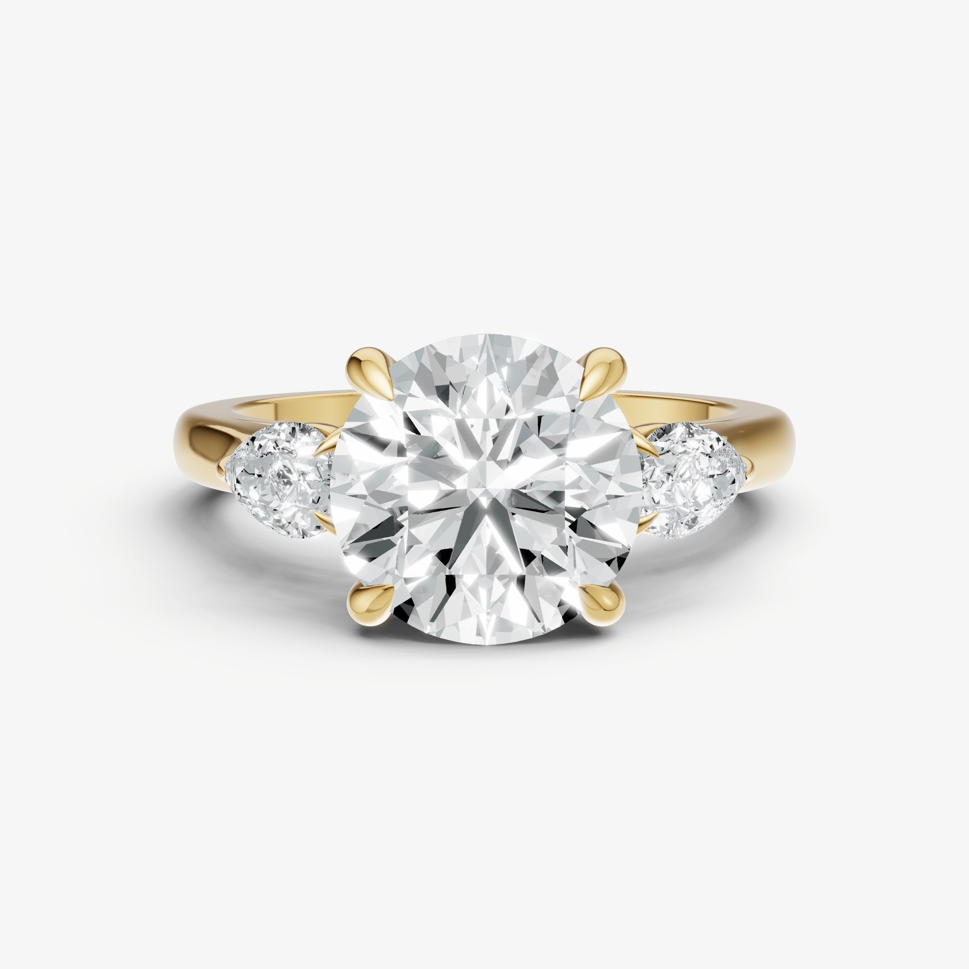 Round Engagement Ring with Pear Side Diamonds
