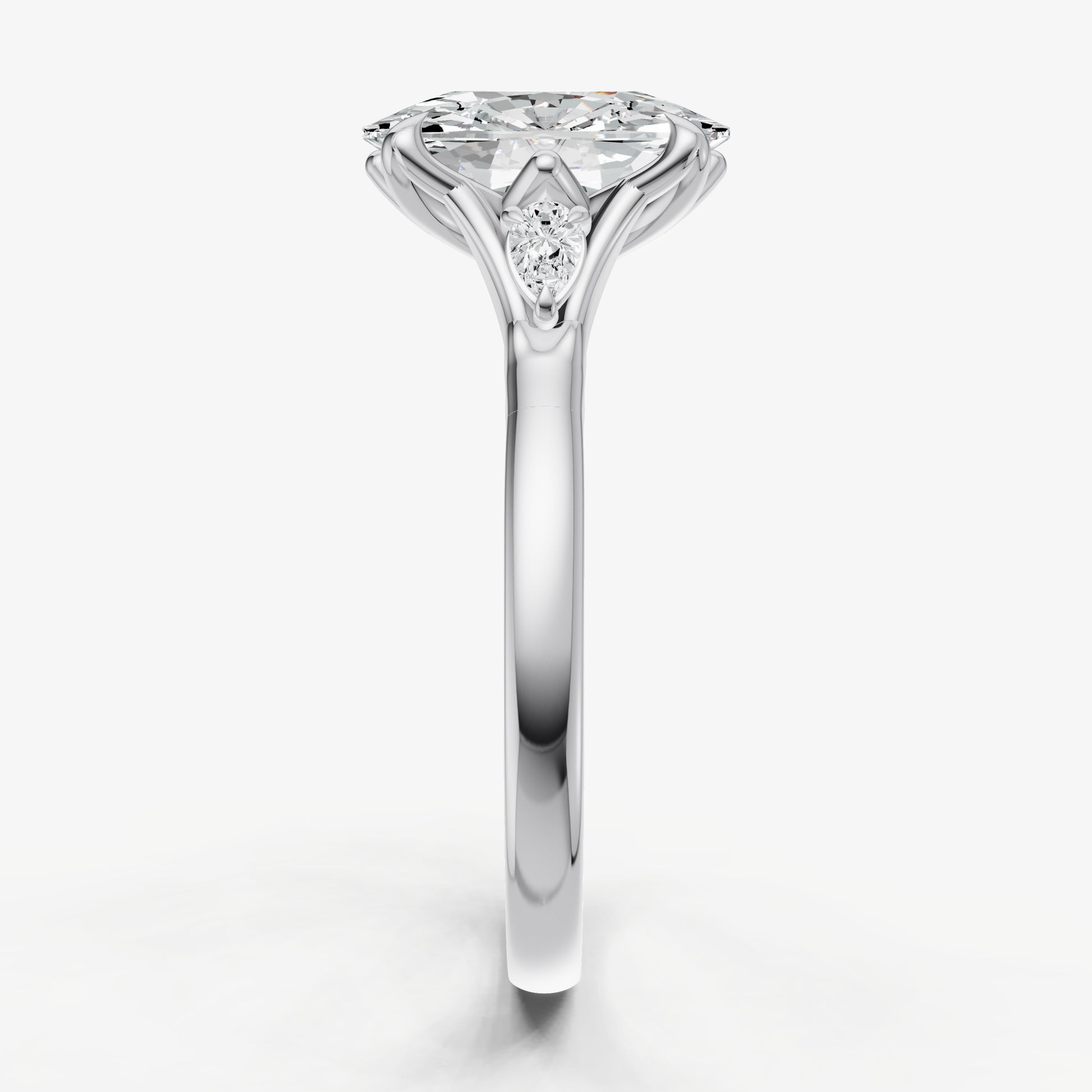 Elongated Cushion Old Mine Cut Vintage Ring with Pear Side Diamonds