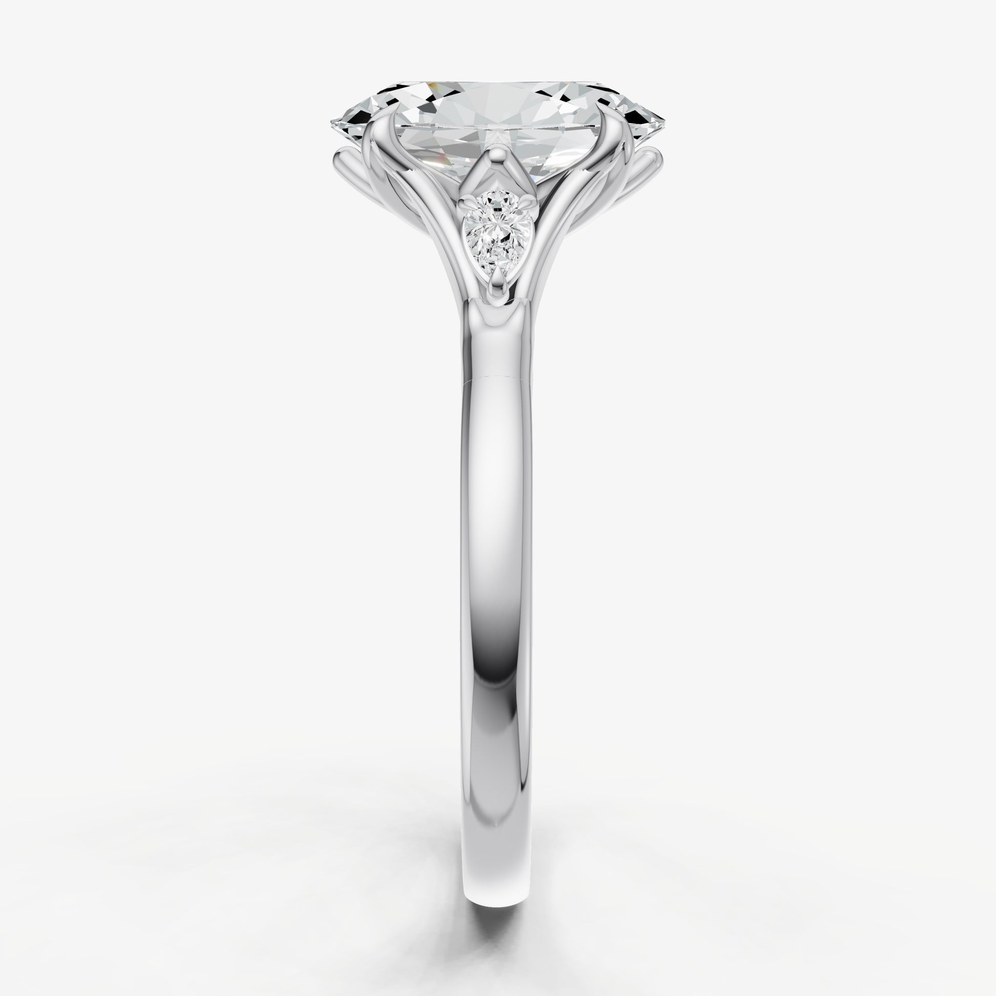 Oval Old Mine Cut Vintage Ring with Pear Side Diamonds