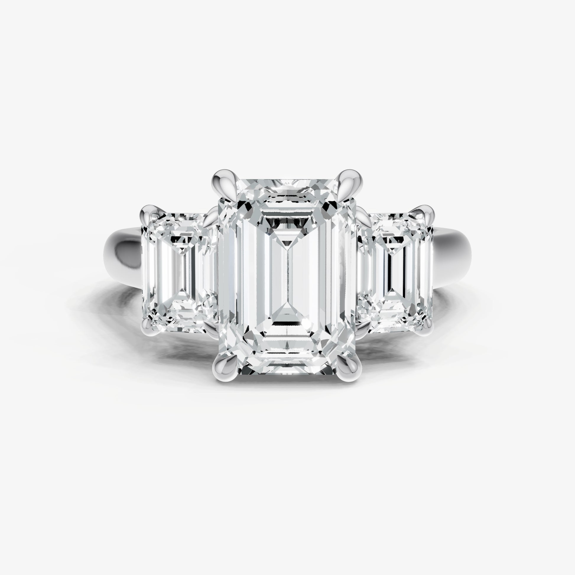 Emerald Trilogy Diamond Engagement Ring with 0.50ct Side Stones