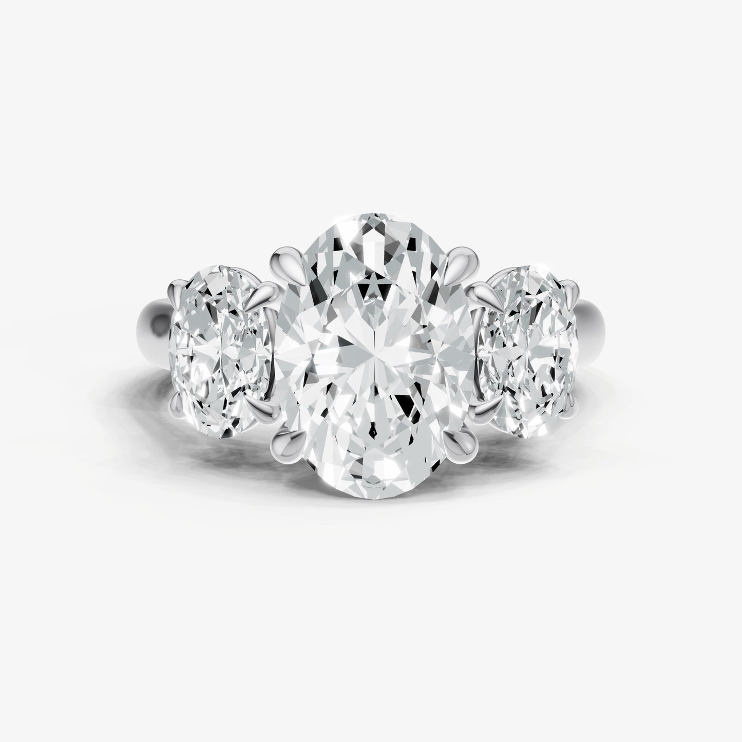 Oval Trilogy Diamond Engagement Ring with 0.50ct Side Stones