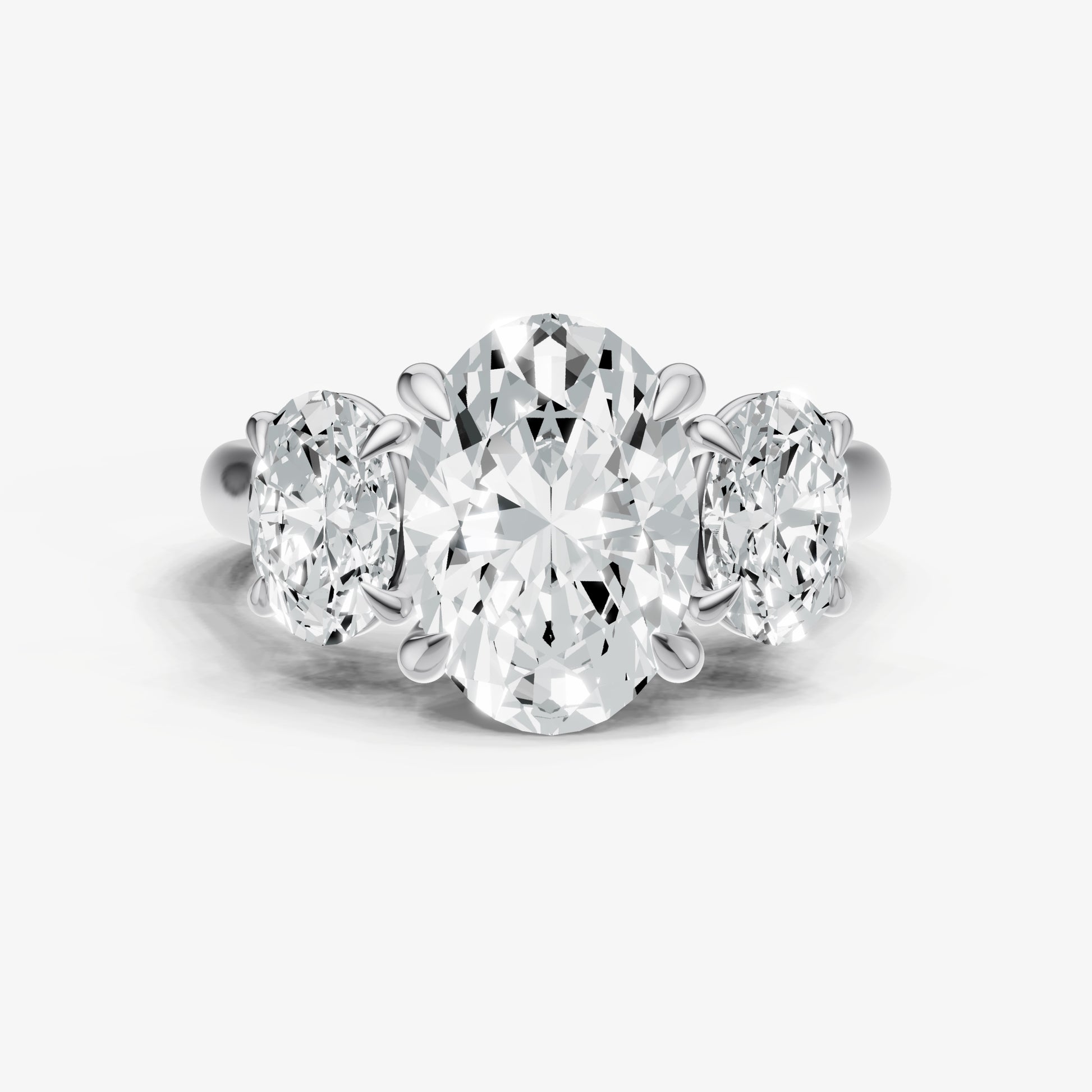 Oval Trilogy Diamond Engagement Ring with 0.50ct Side Stones