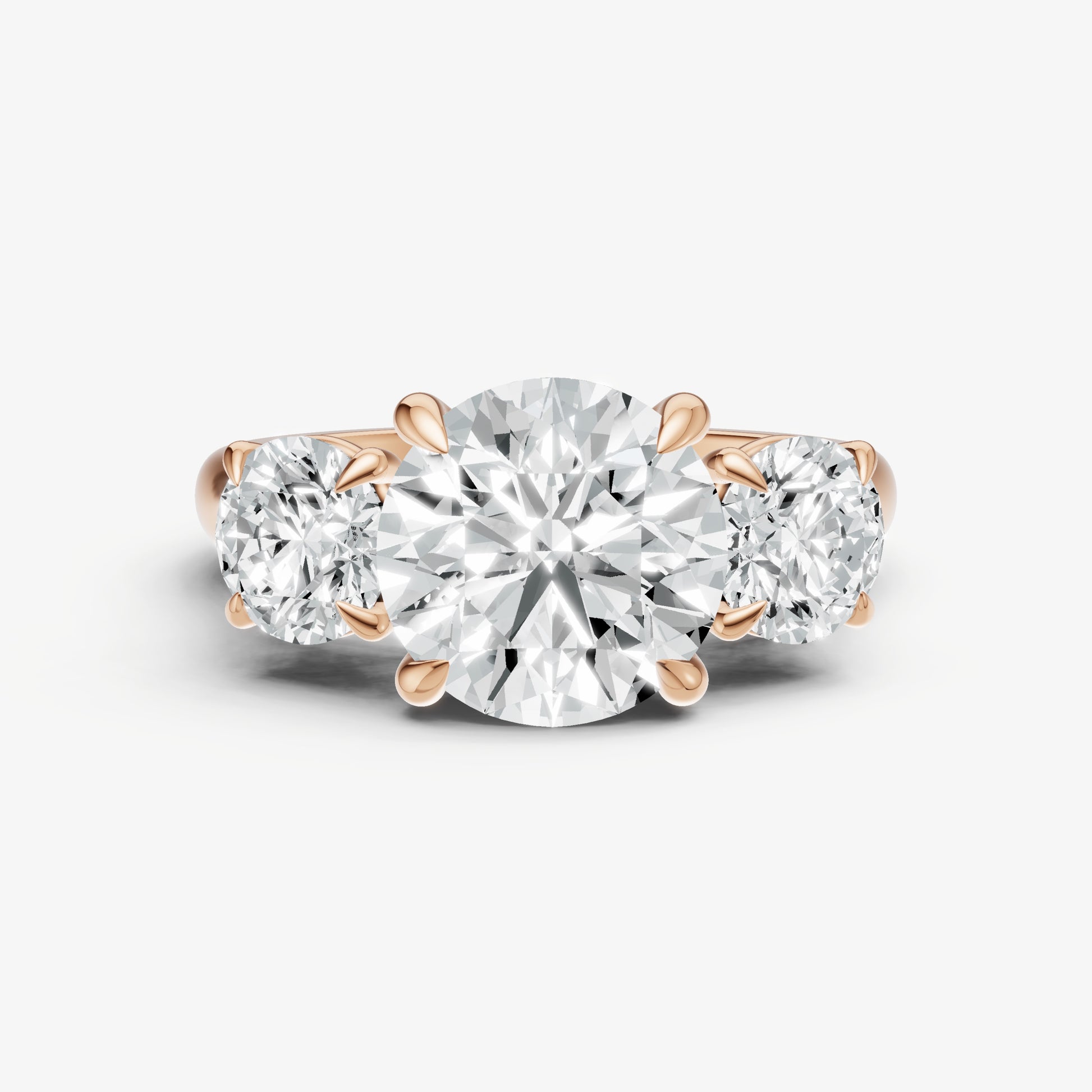Round Trilogy Diamond Engagement Ring with 0.50ct Side Stones