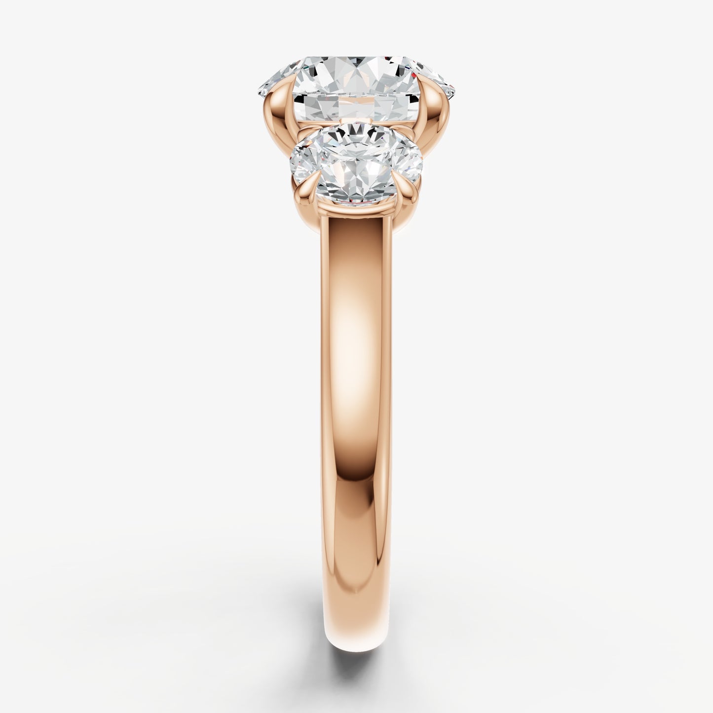 Round Trilogy Diamond Engagement Ring with 0.50ct Side Stones