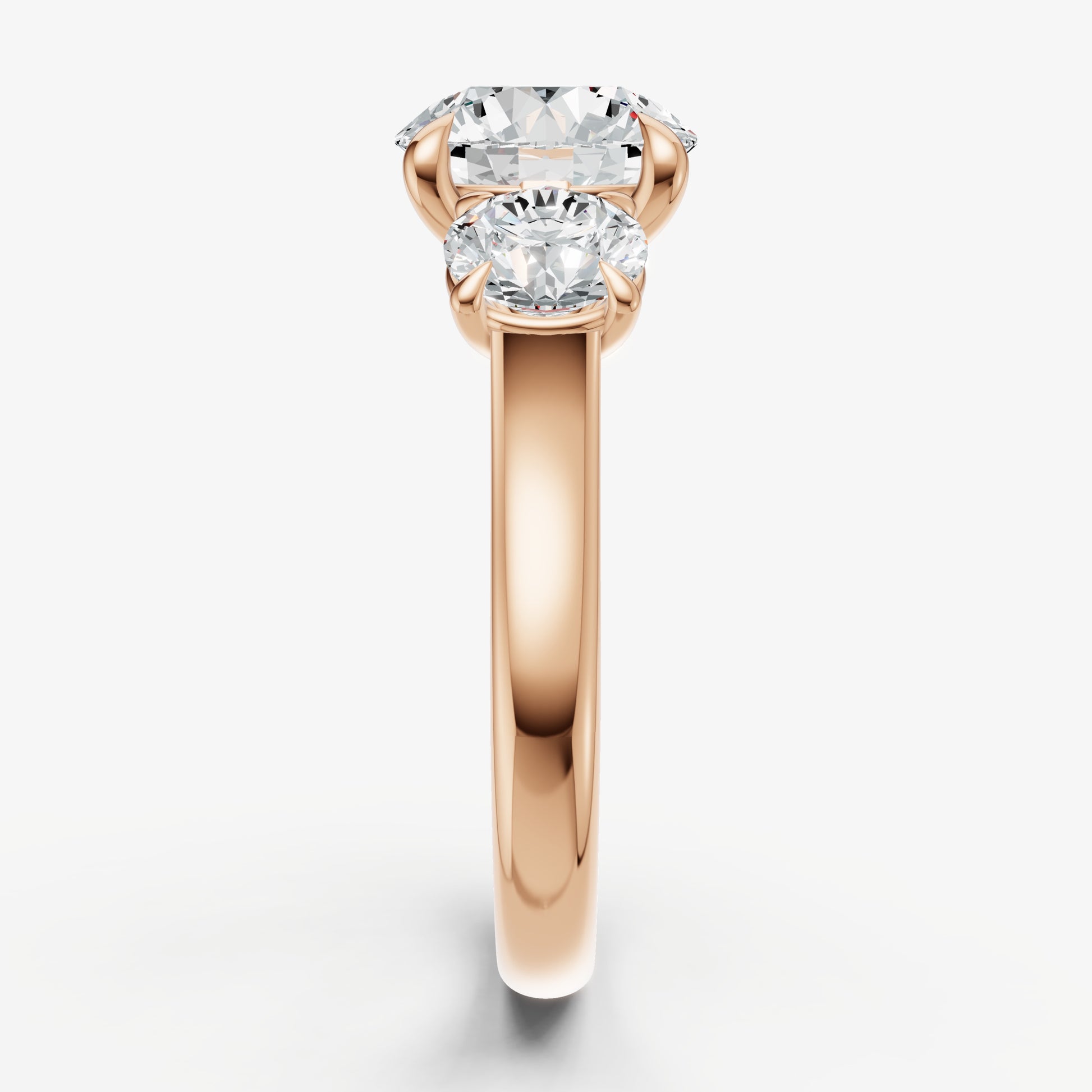 Round Trilogy Diamond Engagement Ring with 0.50ct Side Stones