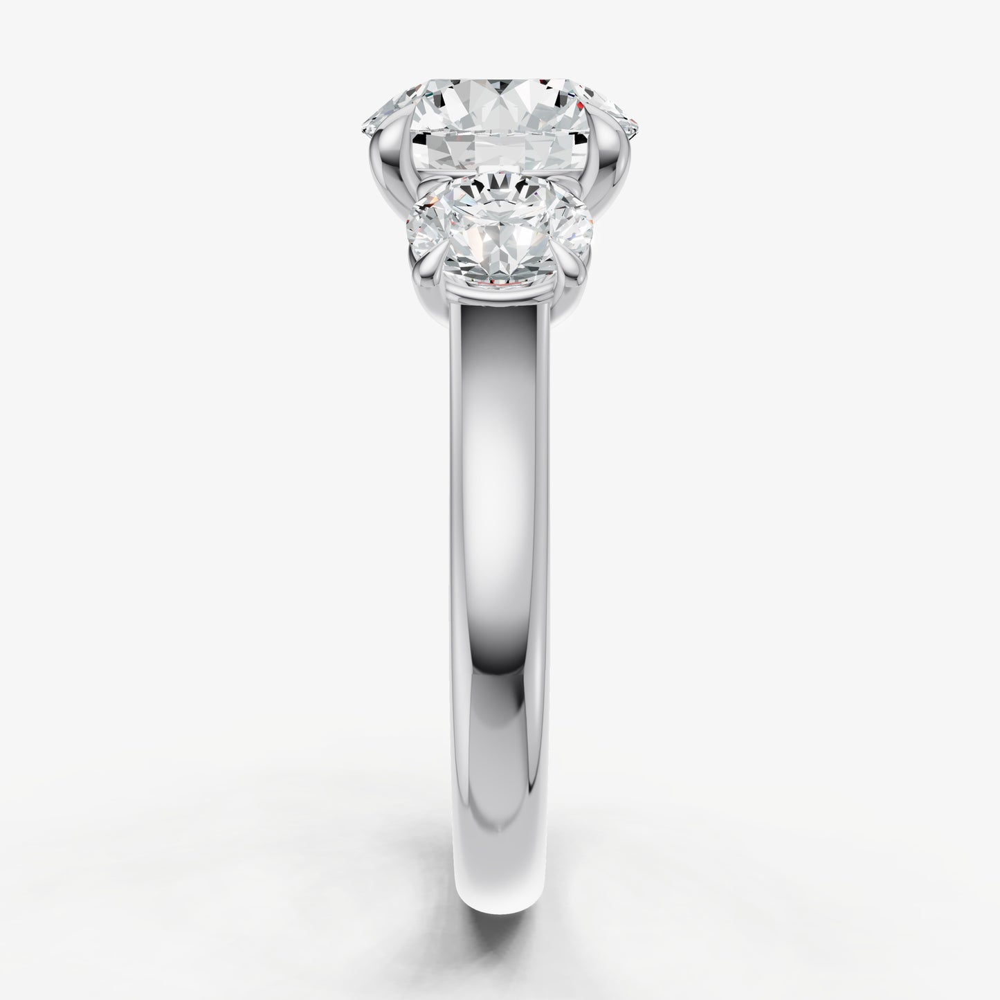 Round Trilogy Diamond Engagement Ring with 0.50ct Side Stones
