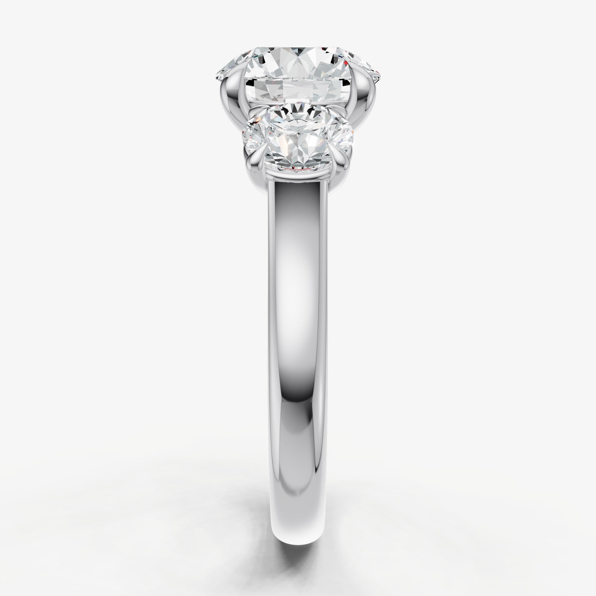 Round Trilogy Diamond Engagement Ring with 0.50ct Side Stones