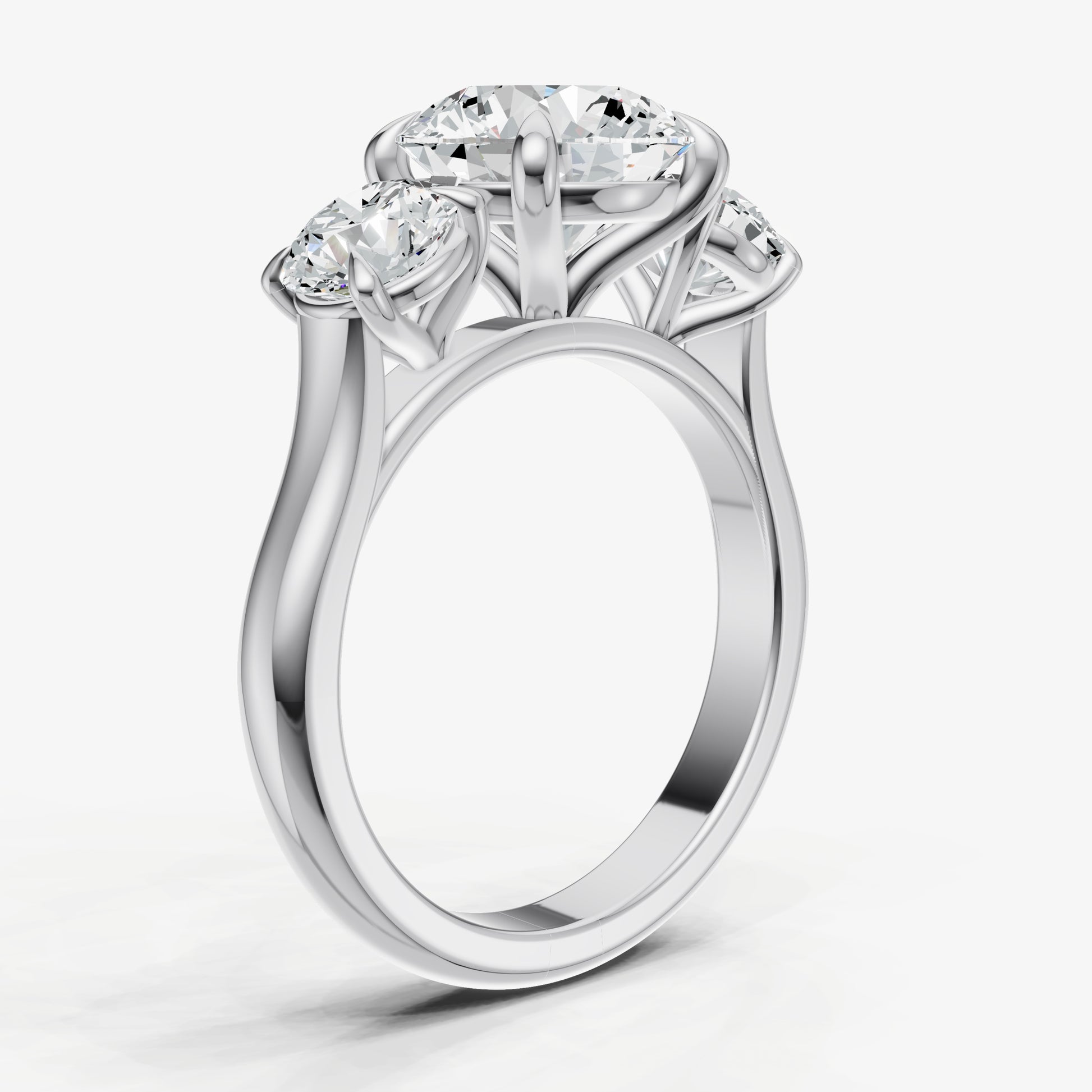 Round Trilogy Diamond Engagement Ring with 0.50ct Side Stones