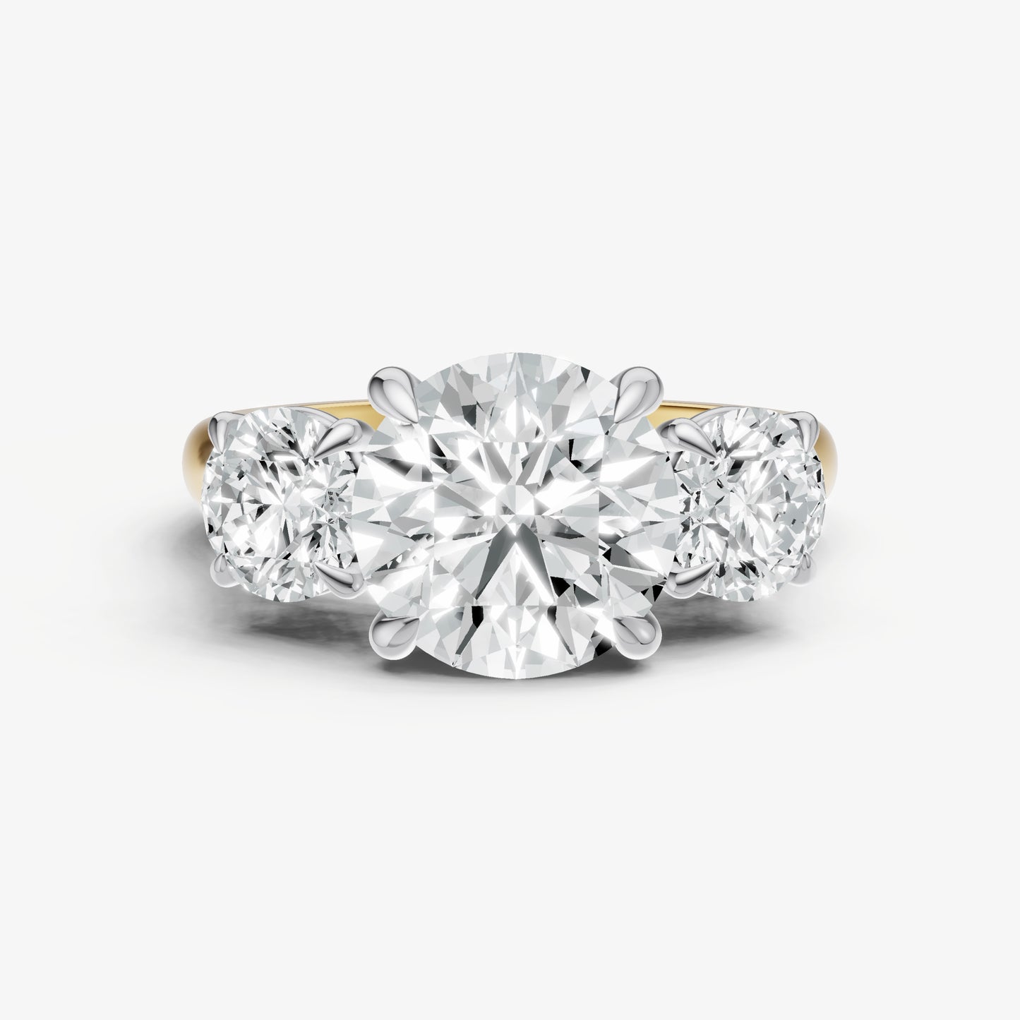 Round Trilogy Diamond Engagement Ring with 0.50ct Side Stones