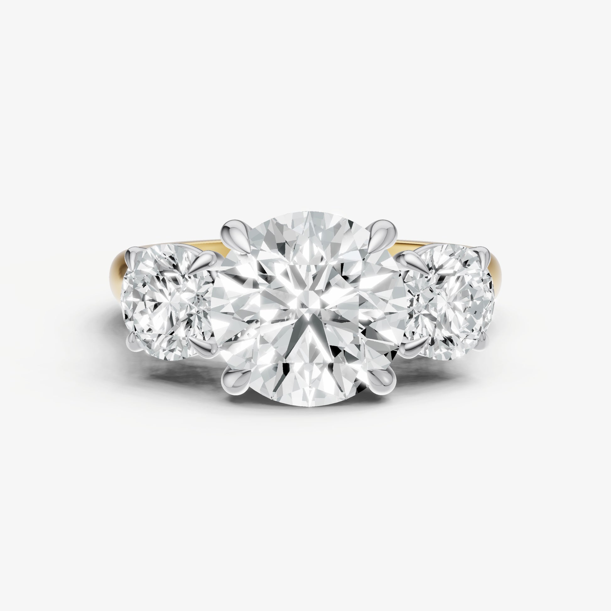 Round Trilogy Diamond Engagement Ring with 0.50ct Side Stones